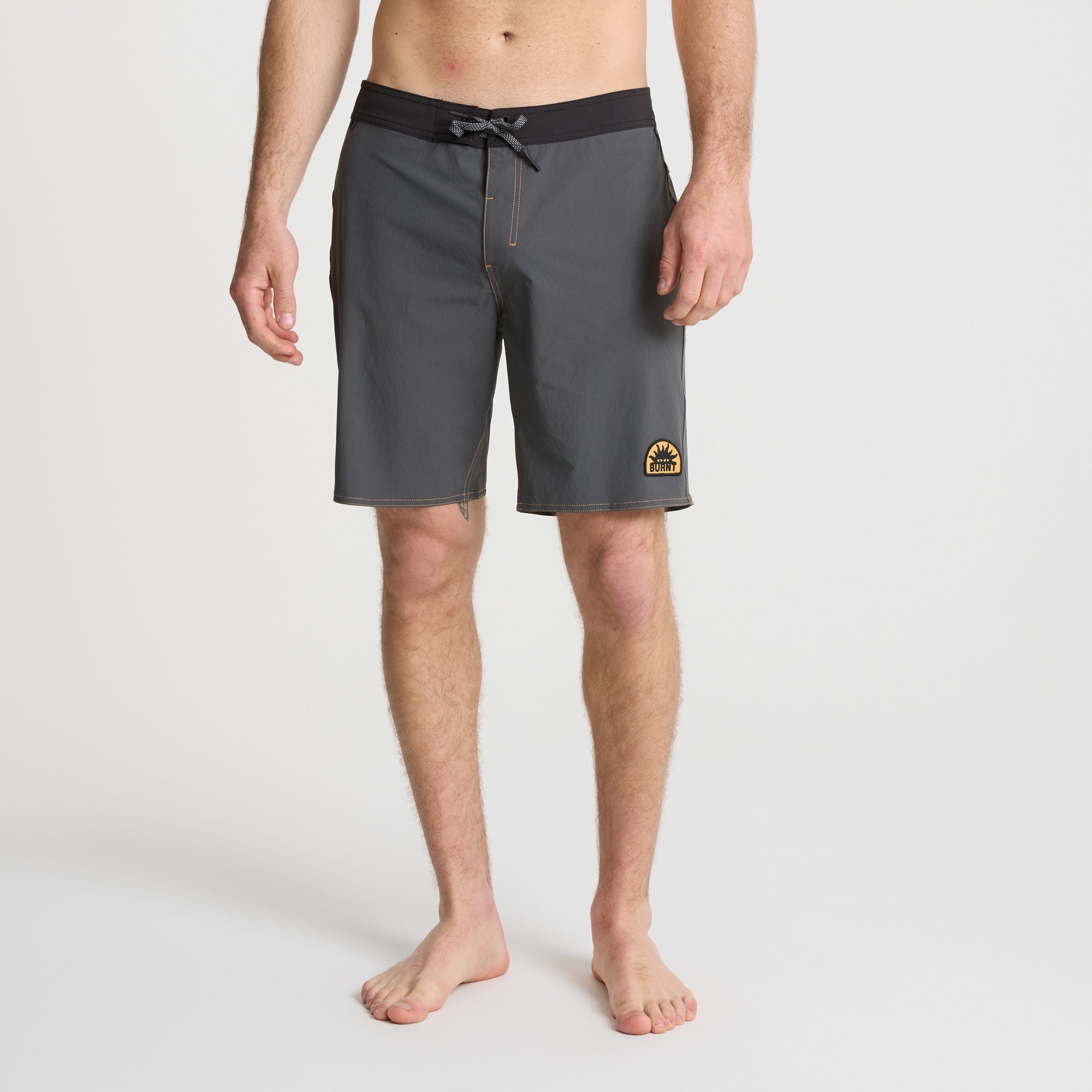 Group of adventurers engaging in water sports at a serene lake in the Lake District, embodying the spirit of leisure and recreation.