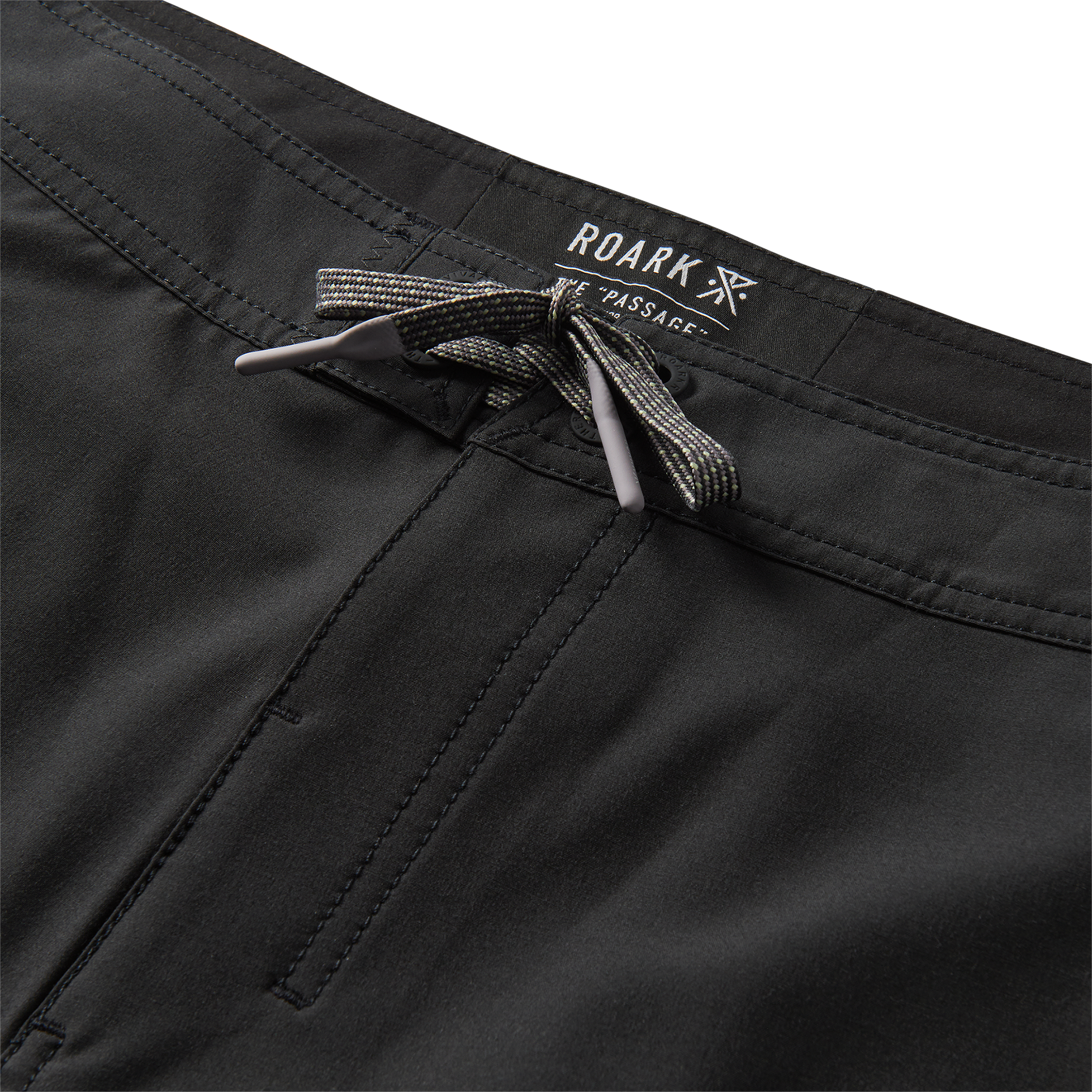 Drawstring waistband detail of black active shorts with printed sides for a secure and stylish fit.