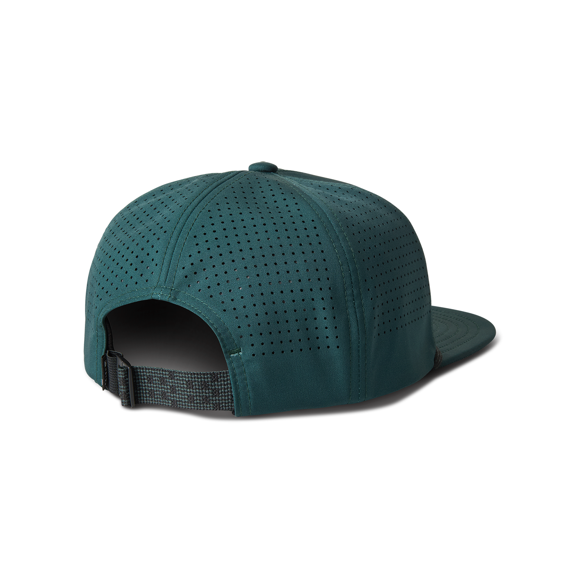 Stylish adventurer wearing a versatile Roark baseball cap in an outdoor setting, perfect for travel and exploration.