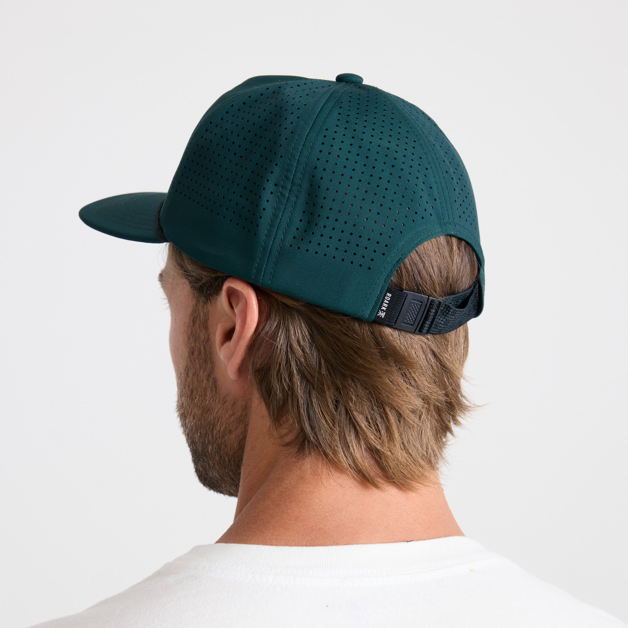 Adventure-ready Roark baseball cap on a natural background, perfect for travel and outdoor activities.