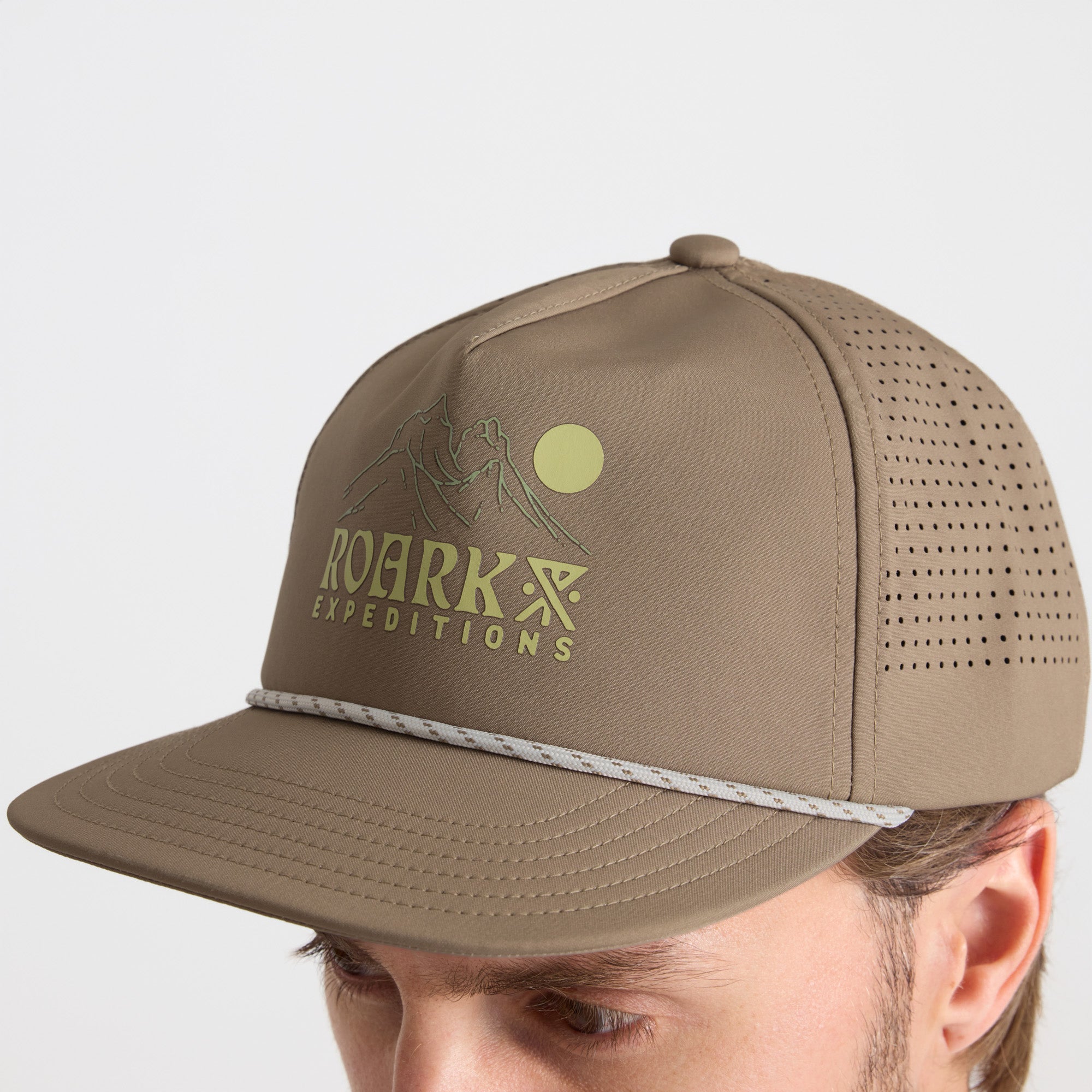 Adventurous cricket cap in khaki, perfect for outdoor travels and exploration, by Roark.