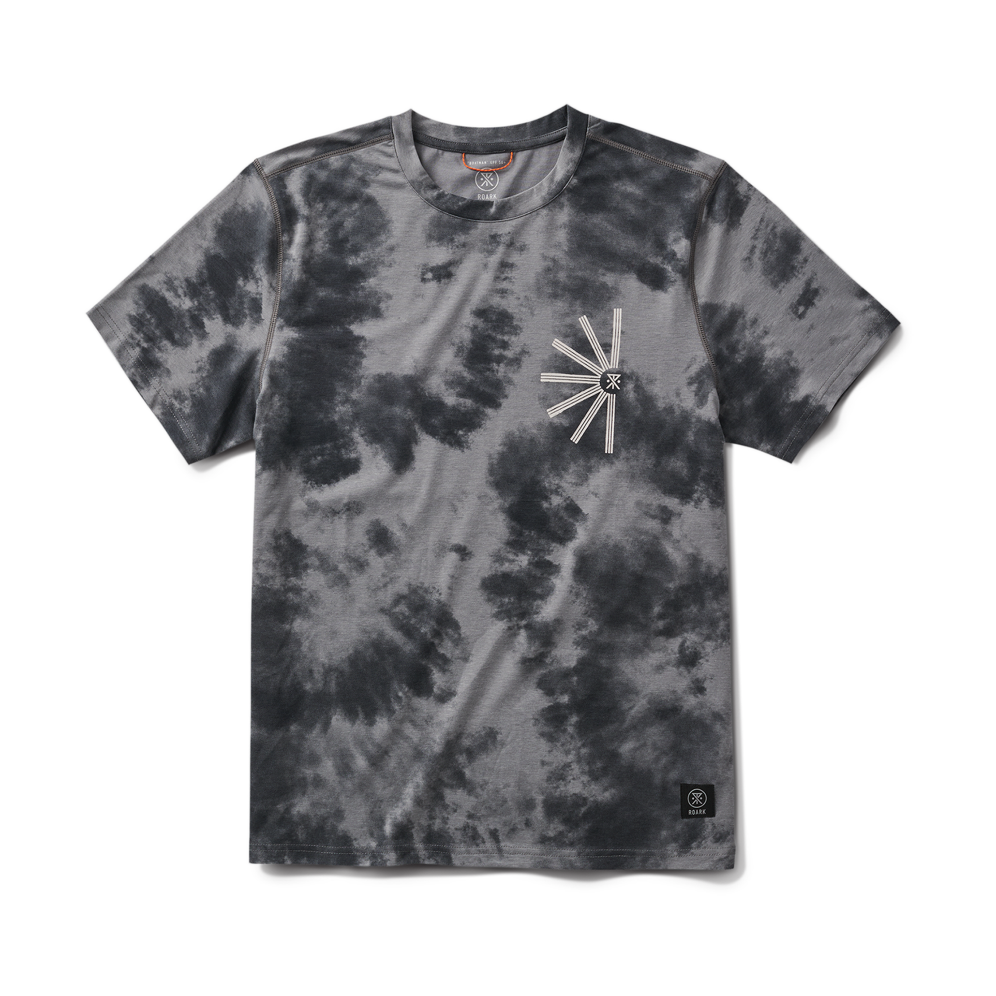 Outdoor adventure enthusiast in casual gear exploring a scenic trail with Roark branding