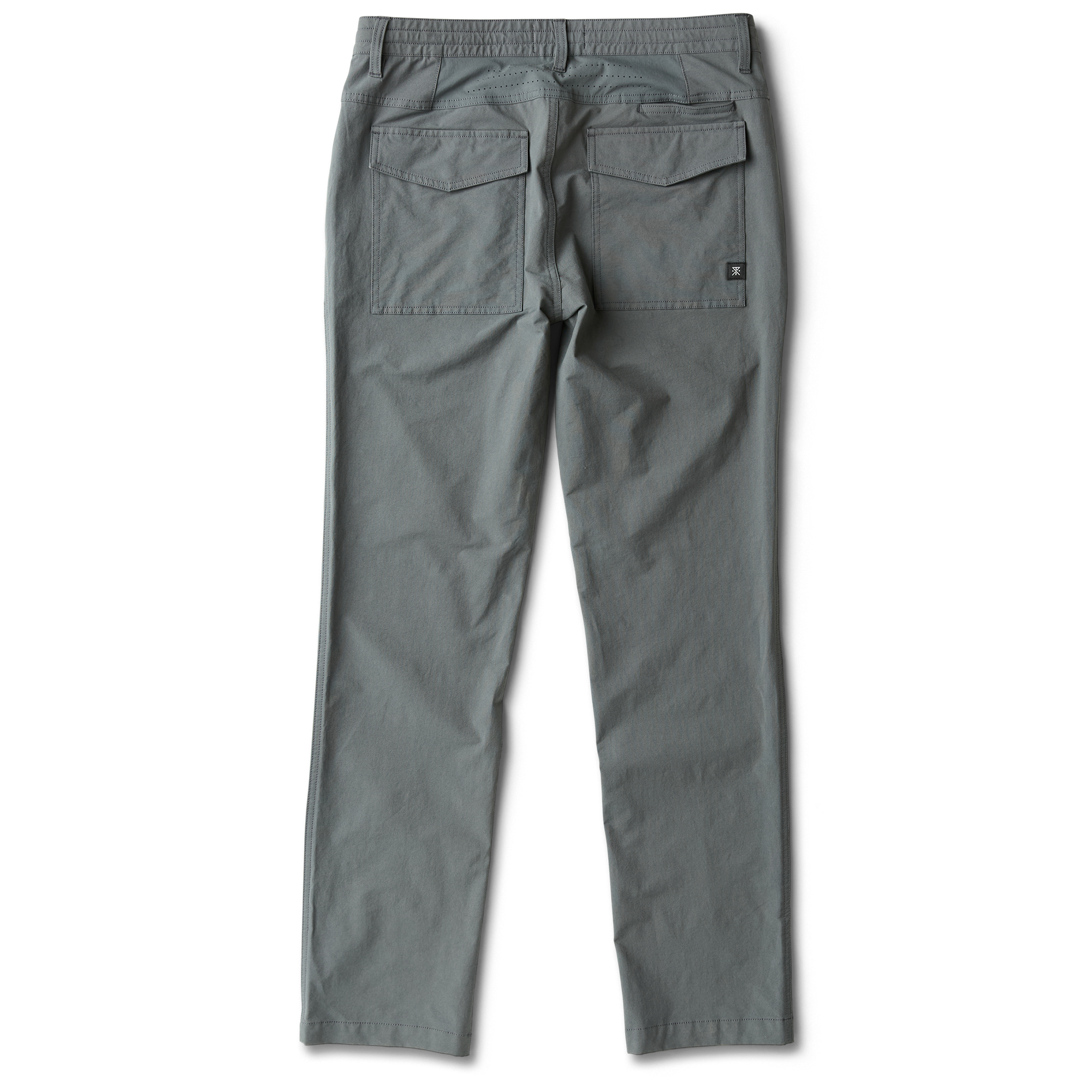 Adventure-ready men's outdoor travel gear by Roark, showcasing durable and stylish design elements in a rugged setting.