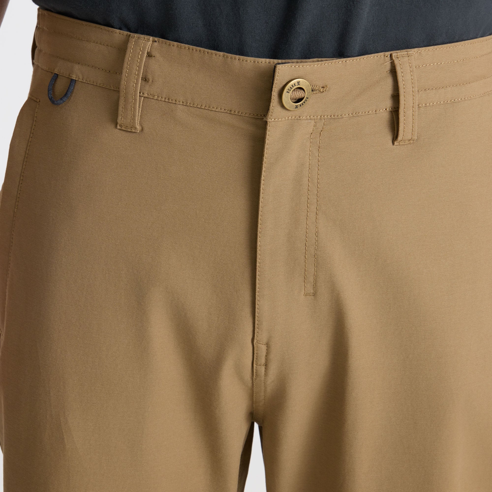 Scenic view of a sports venue surrounded by dense conifer forest, capturing the essence of adventure and nature.