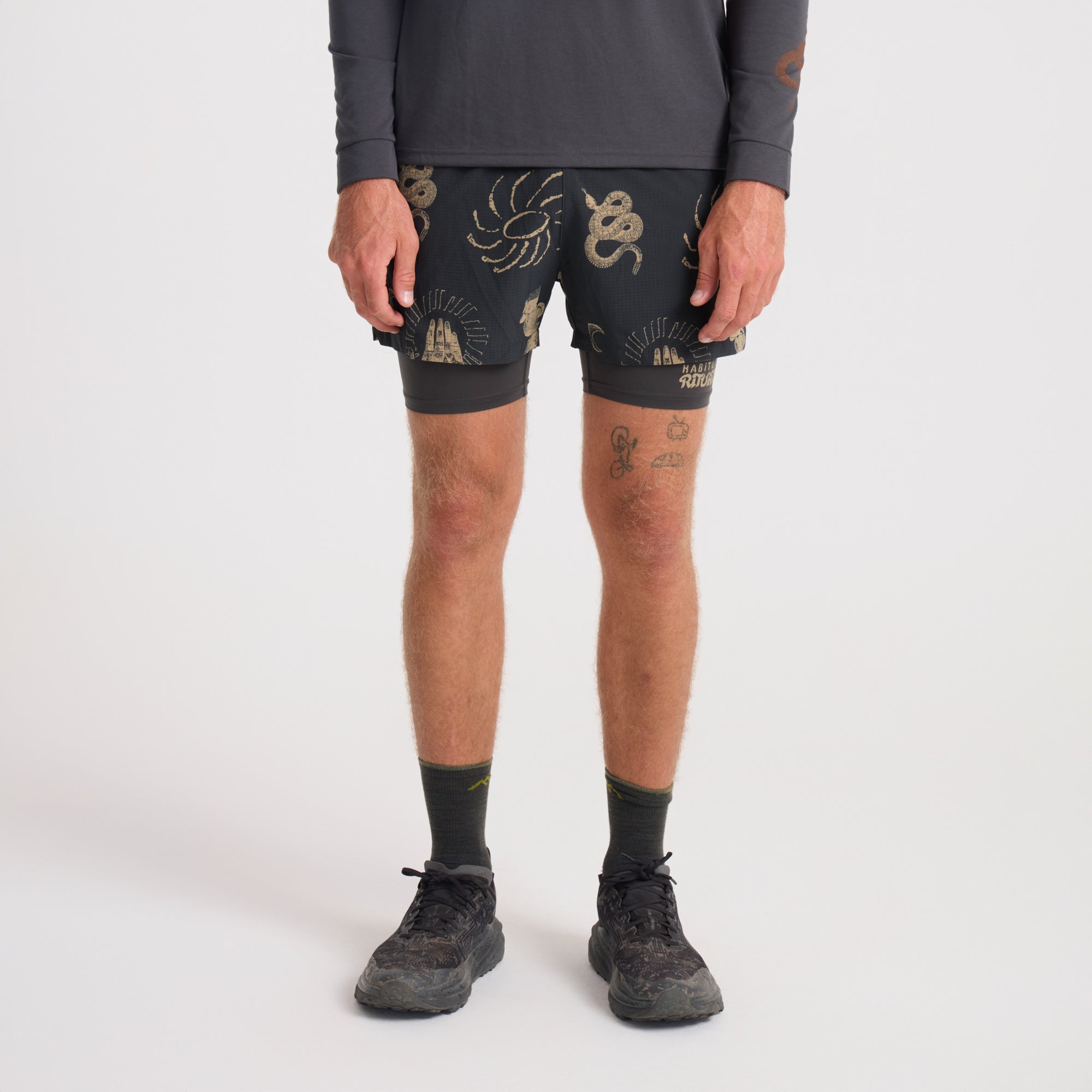 Pair of Roark brown active Bermuda-style boardshorts suitable for adventurous and outdoor activities.