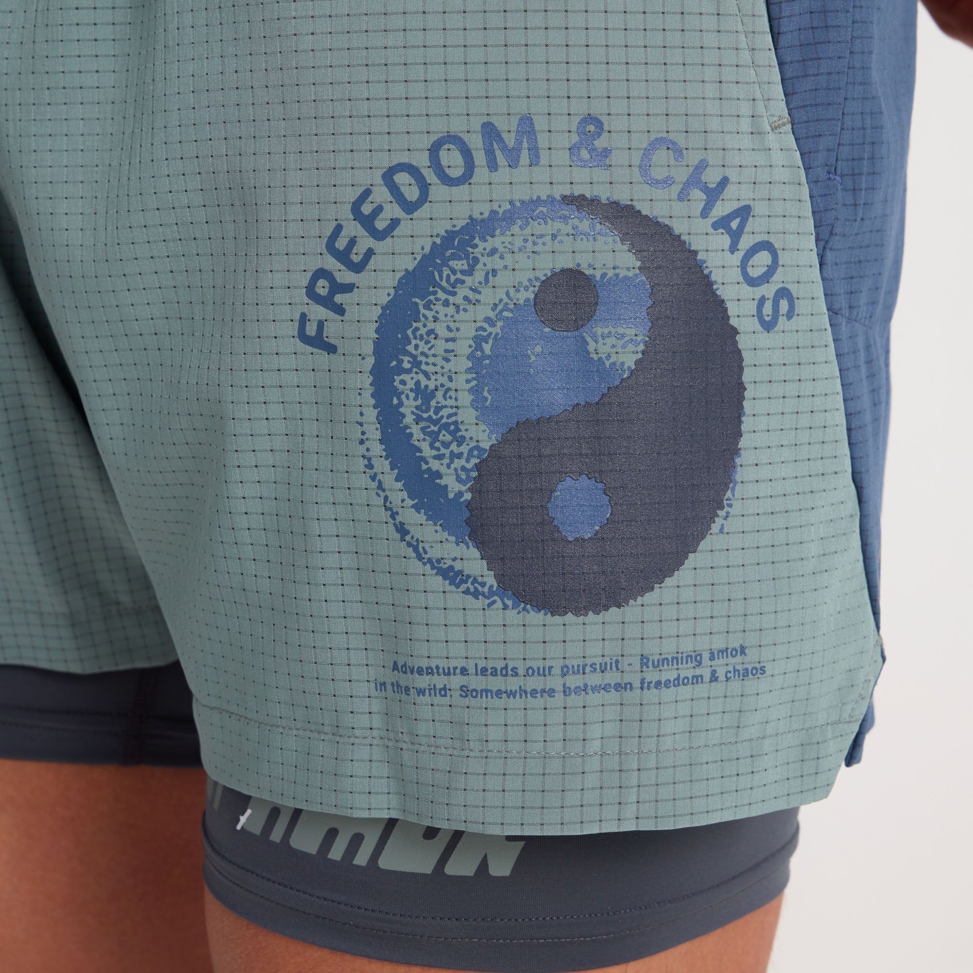 Assortment of Roark active and adventure wear including active shirt, shorts, and boardshorts in nature-inspired designs, perfect for outdoor adventures and travel.