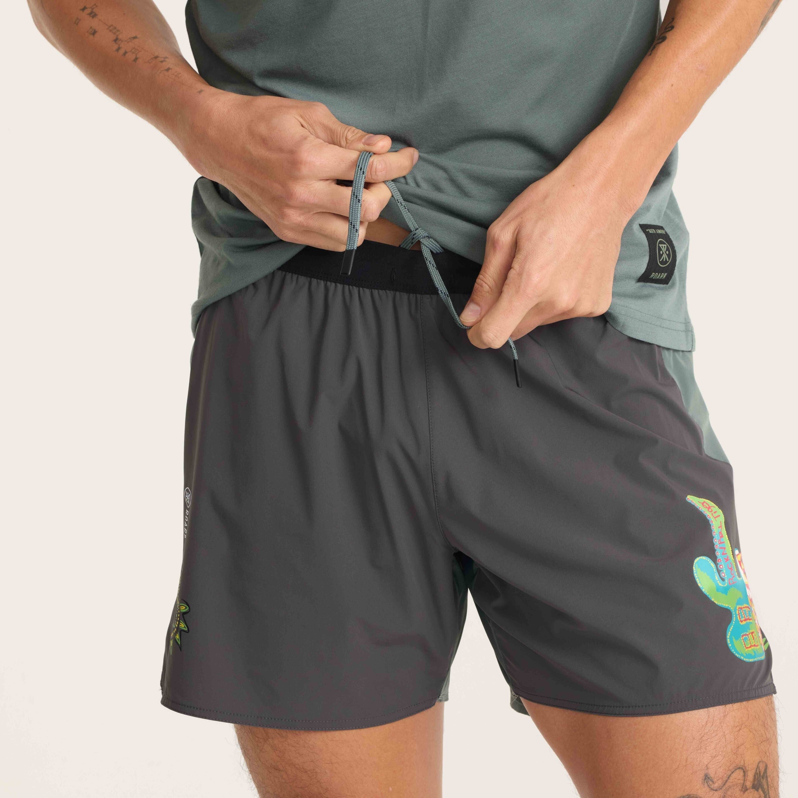 High-quality stitching and branded logo details make these active shorts a standout choice.