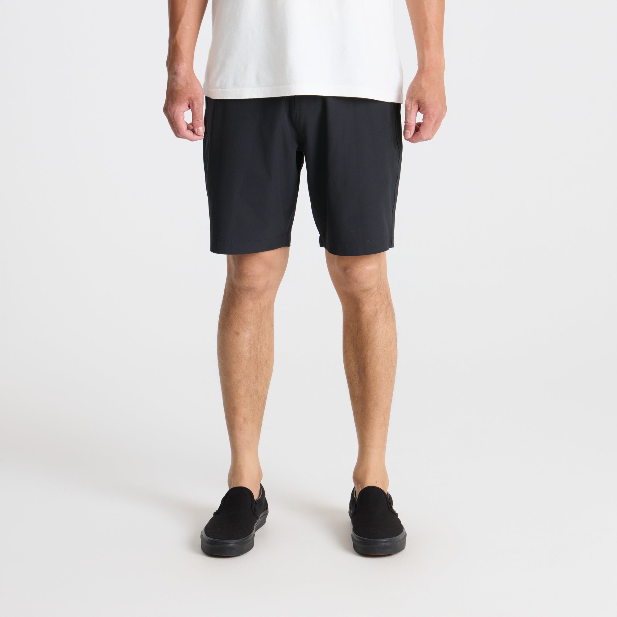 Grey Bermuda-style active shorts by Roark, ideal for outdoor adventures and travel, showcasing mid-calf length and boardshorts design.