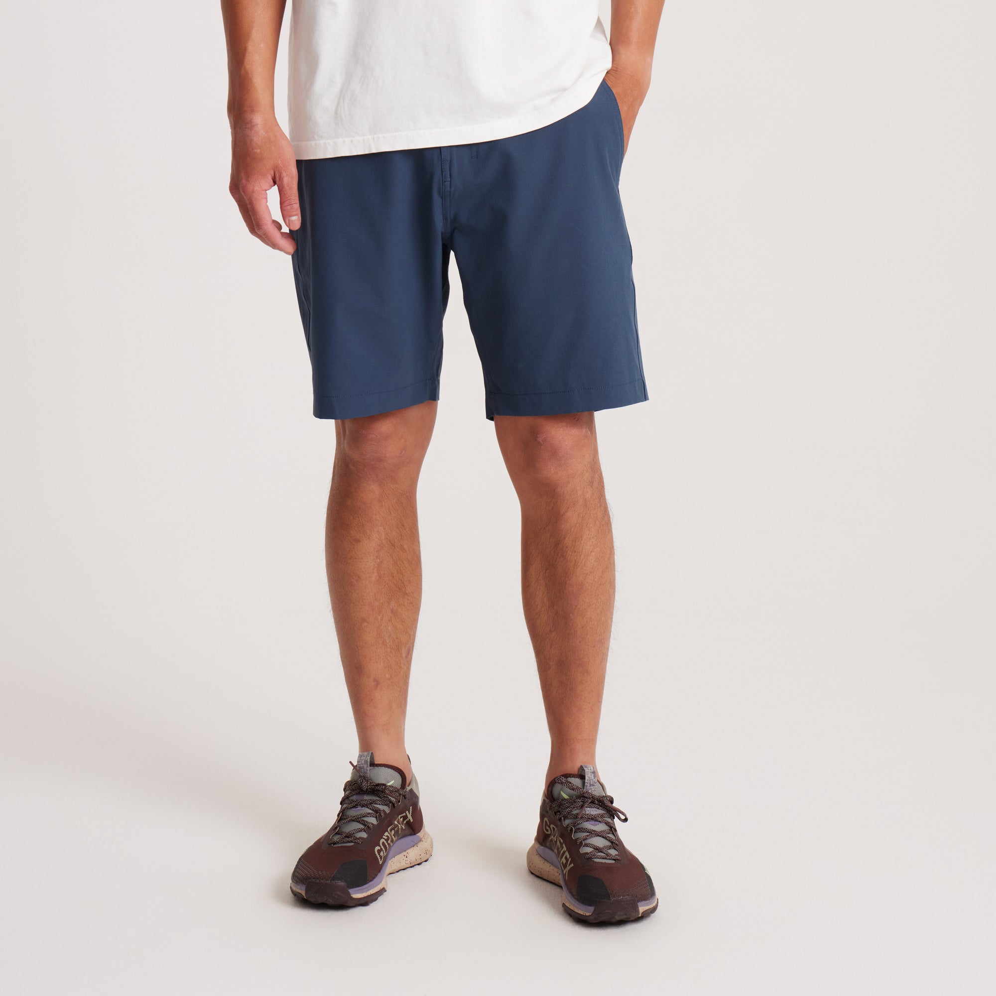 Front view of navy hybrid shorts showcasing their sleek design and functional fit, perfect for outdoor adventures and casual wear.