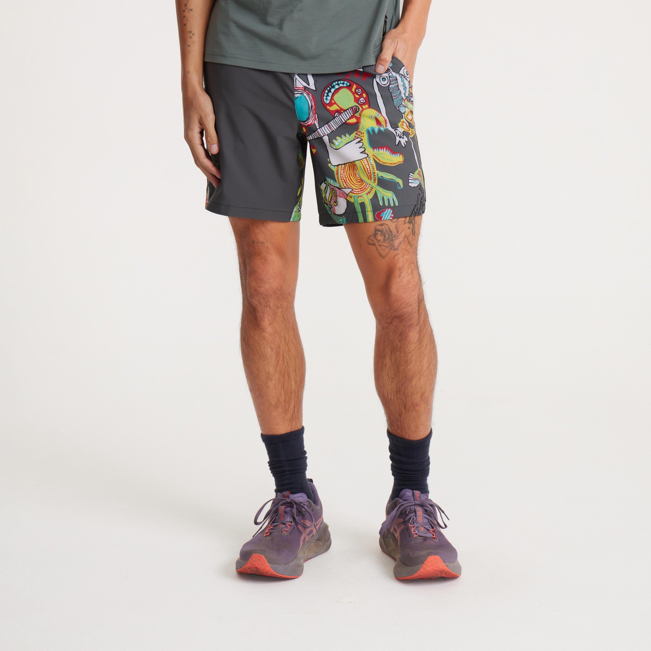 Men's swim shorts featuring colorful graphic prints, lightweight fabric, and adjustable waistband for a comfortable fit.