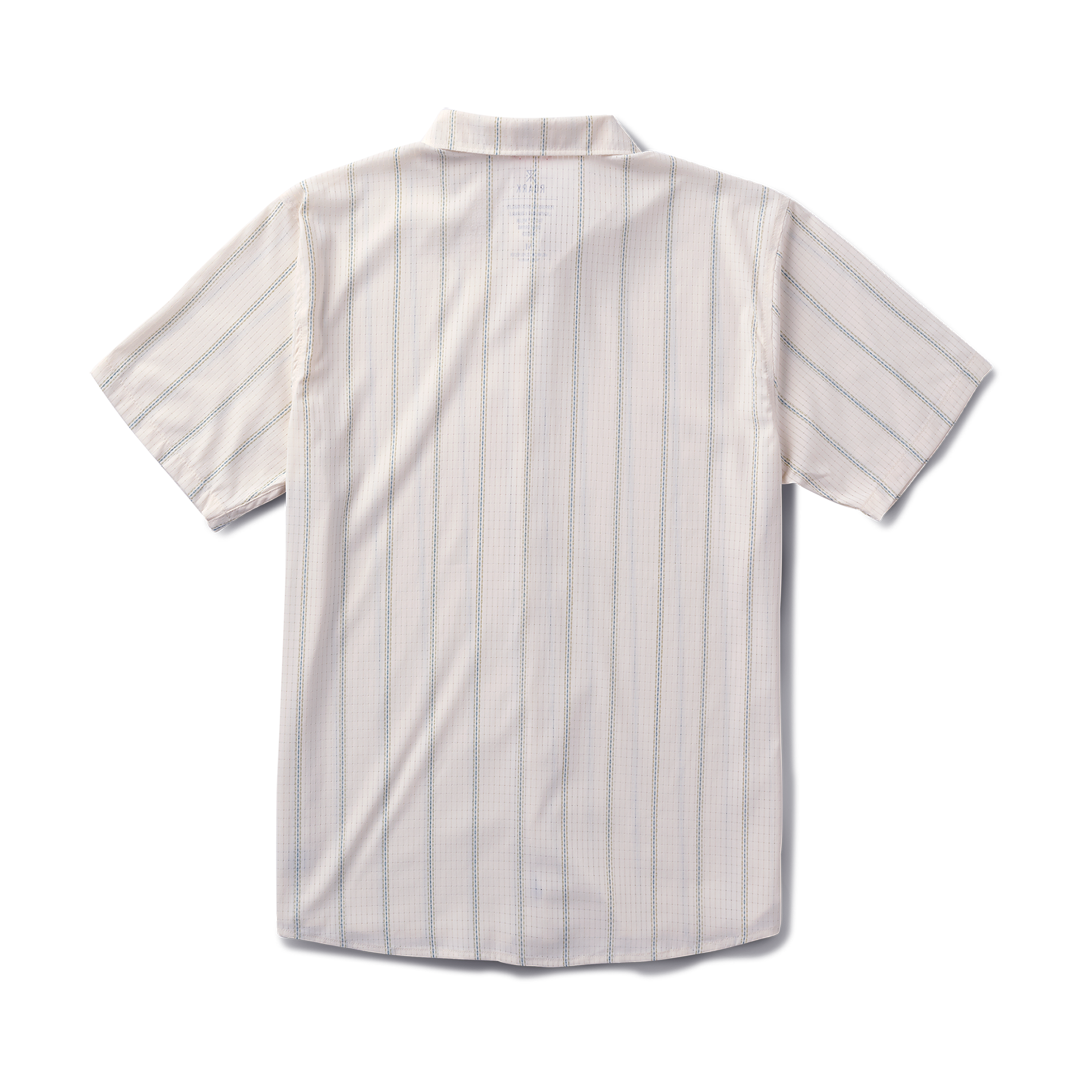 Close-up of a white Roark dress shirt featuring a detailed collar and buttons, designed for adventure and travel.