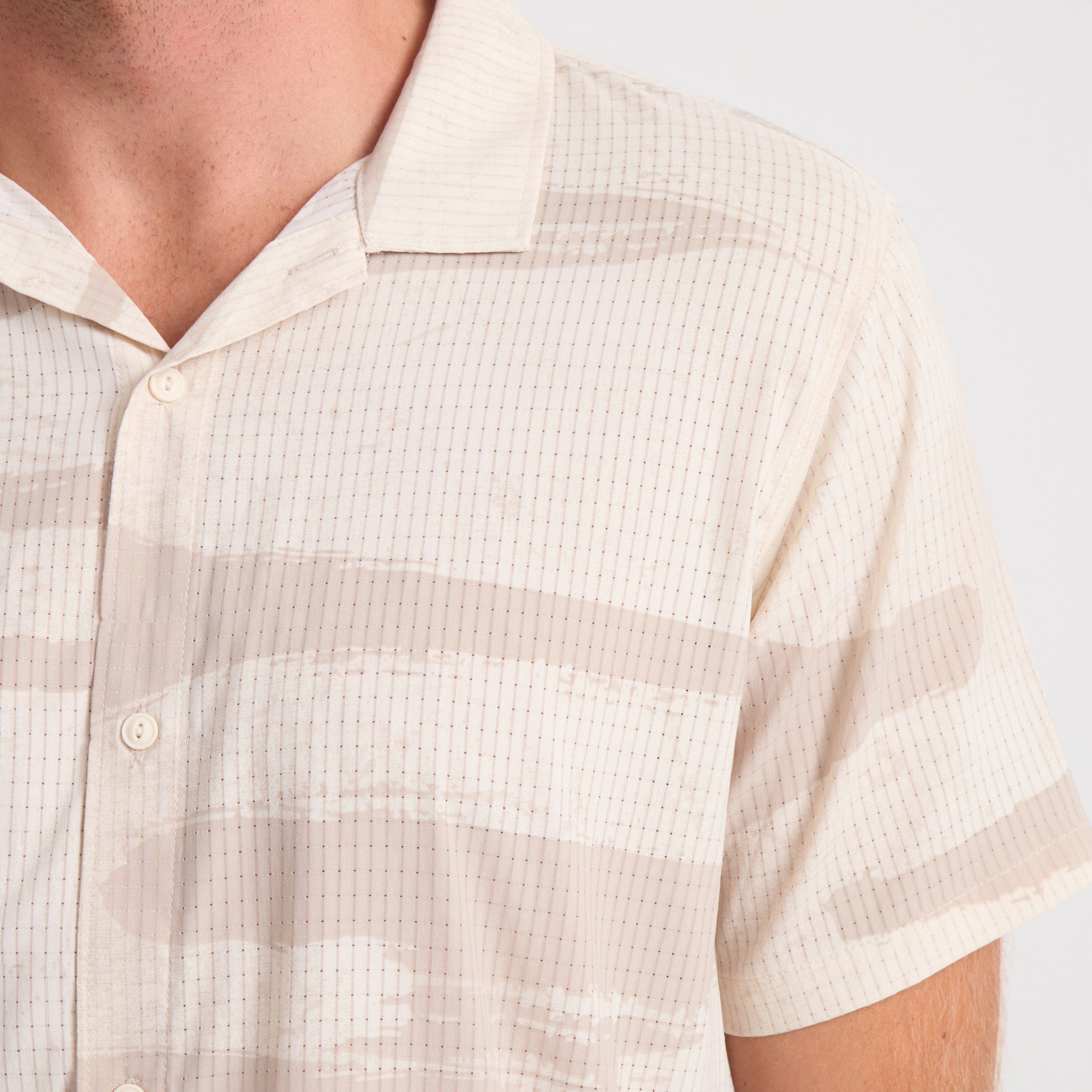 Durable outdoor shirt featuring rugged buttons, sturdy collar, and high-quality textile design, perfect for adventure and travel.