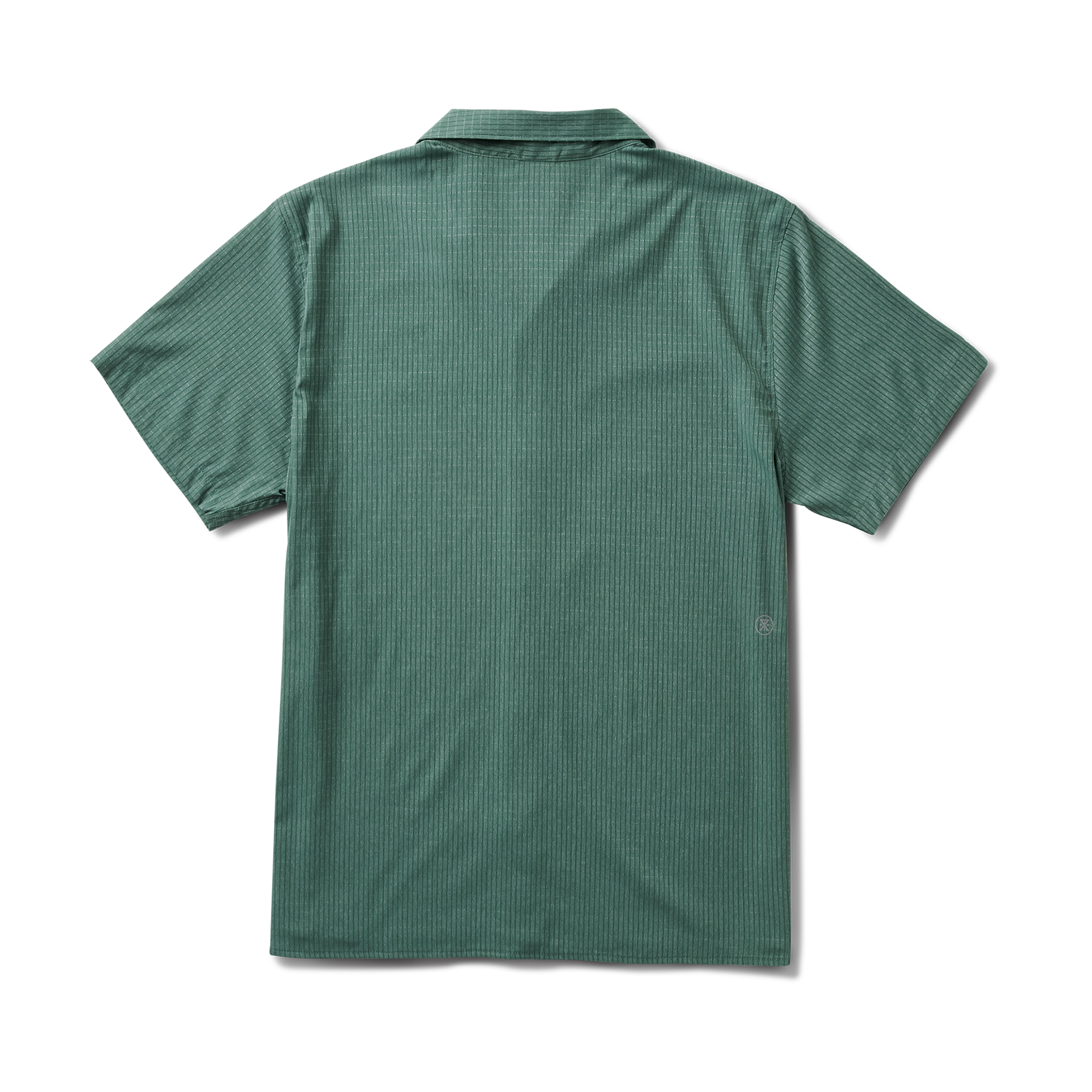 Detail of a Roark active shirt featuring a sturdy collar and button design, perfect for adventure and travel