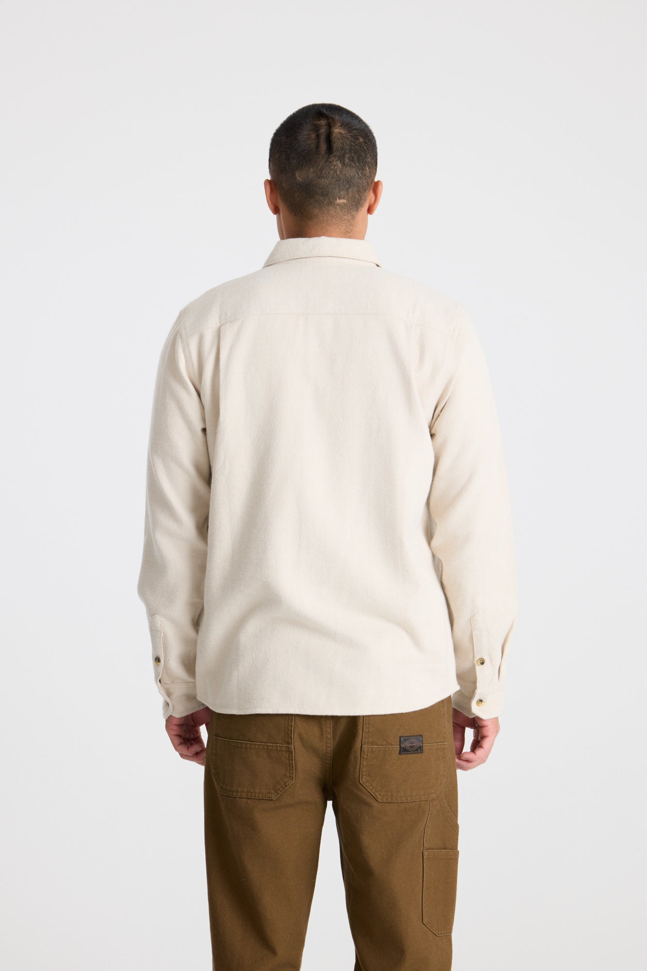 Roark adventure gear in a natural, rugged setting, emphasizing durability and style for outdoor enthusiasts.