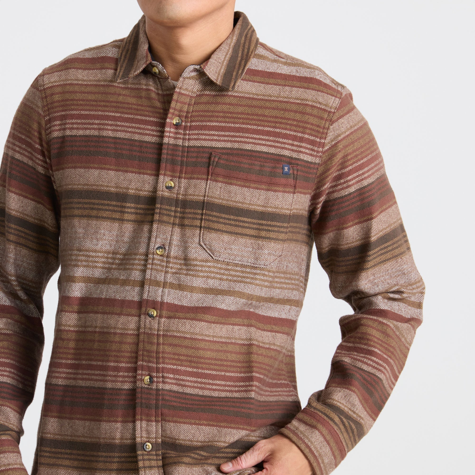 Close-up view of a brown textured material, evoking the rugged, outdoor essence of adventure and travel.