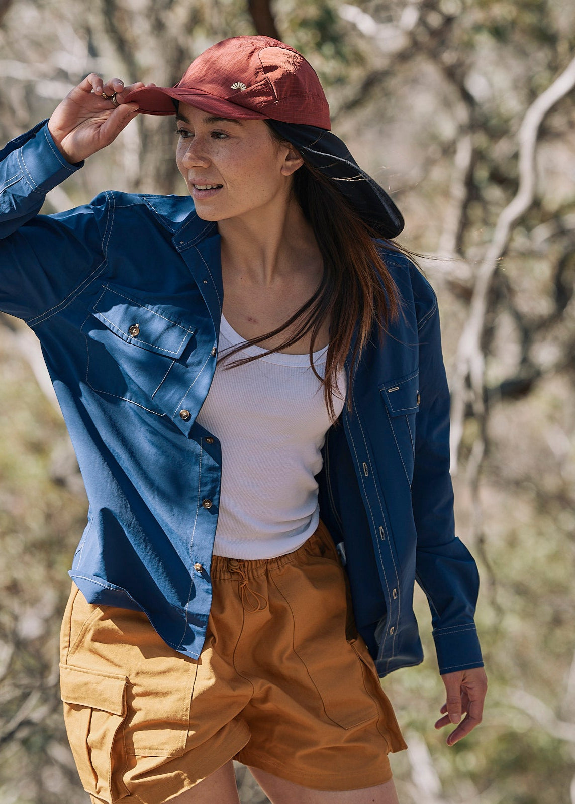 Person wearing a blue Sun Ray UPF50+ sun protection overshirt sun shirt