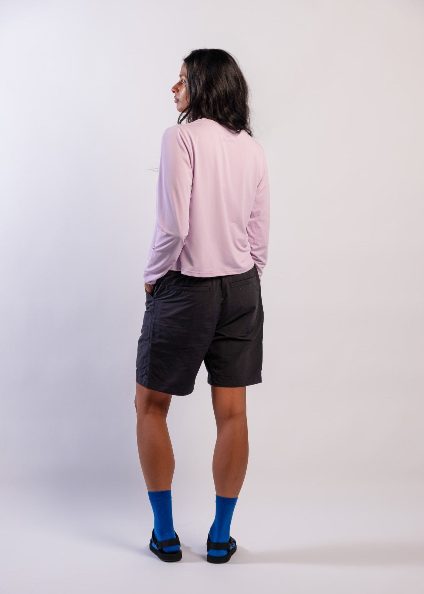 A sun smart woman wears the Sun Ray UPF50+ Sun Protection Clothing All G Long Sleeve Tee lilac boxy fit