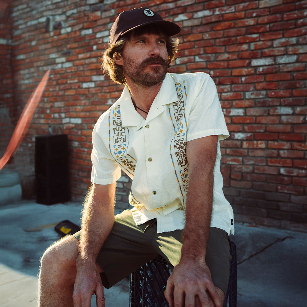 Drew Smith in the Roark Gonzo button up shirt with aztec pattern.