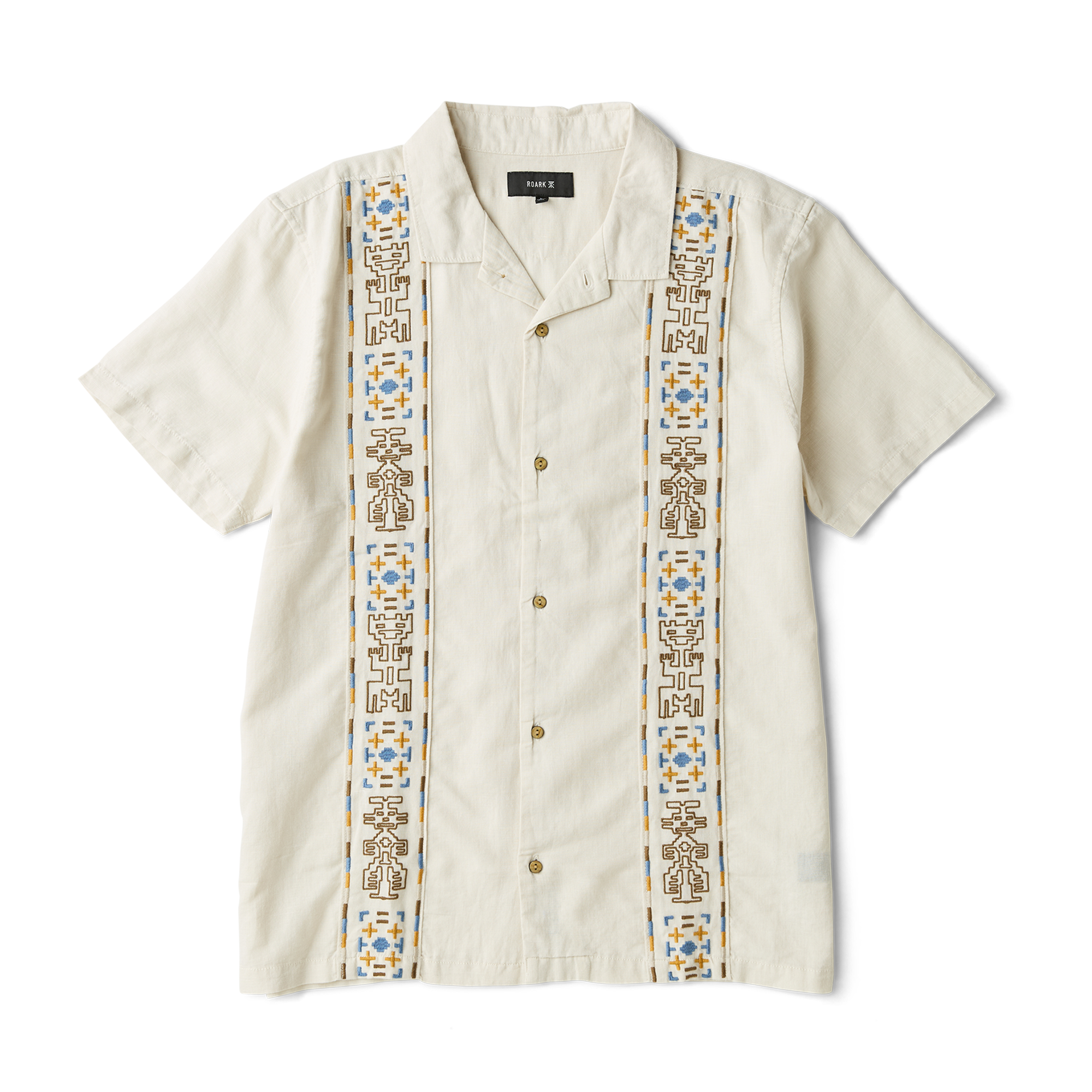 Close-up view of a rugged outdoor shirt featuring detailed stitching on the sleeve, sturdy collar, and secure buttons, perfect for adventure and travel.