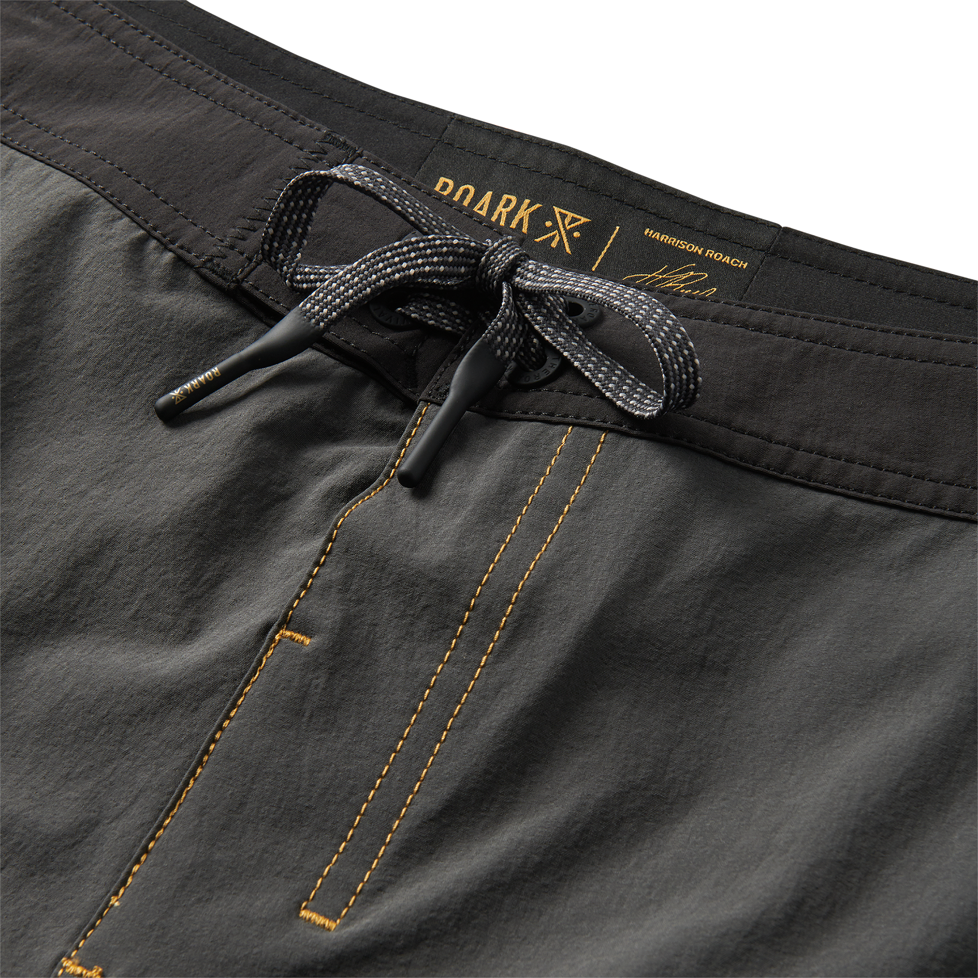 Explore with Roark in a captivating charcoal outfit, perfect for adventurous travels and outdoor activities.