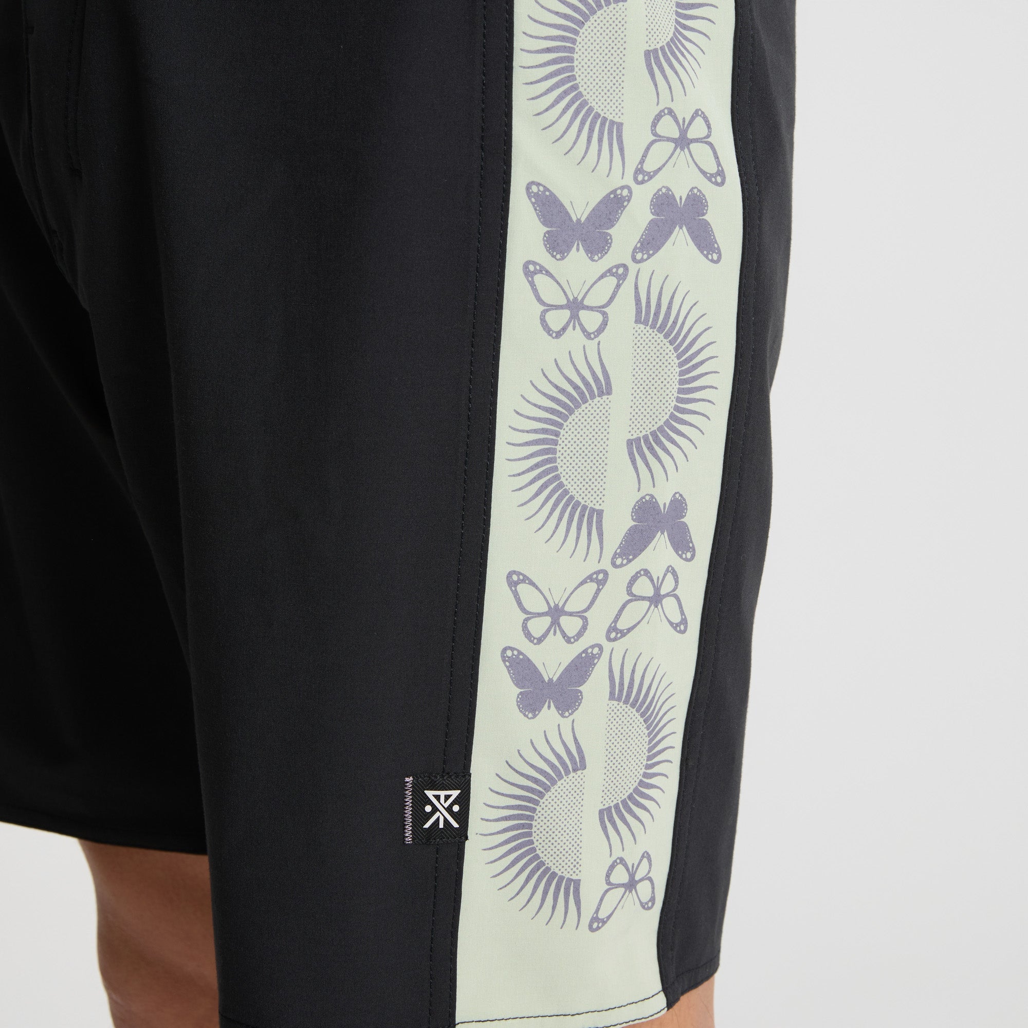 Versatile black boardshorts perfect for adventure and outdoor activities, featured in Roark's collection.