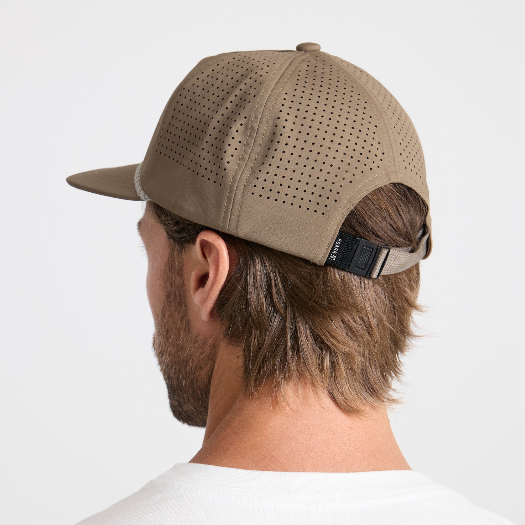 Stylish cricket cap with visor in khaki color, perfect for outdoor adventures and travel.