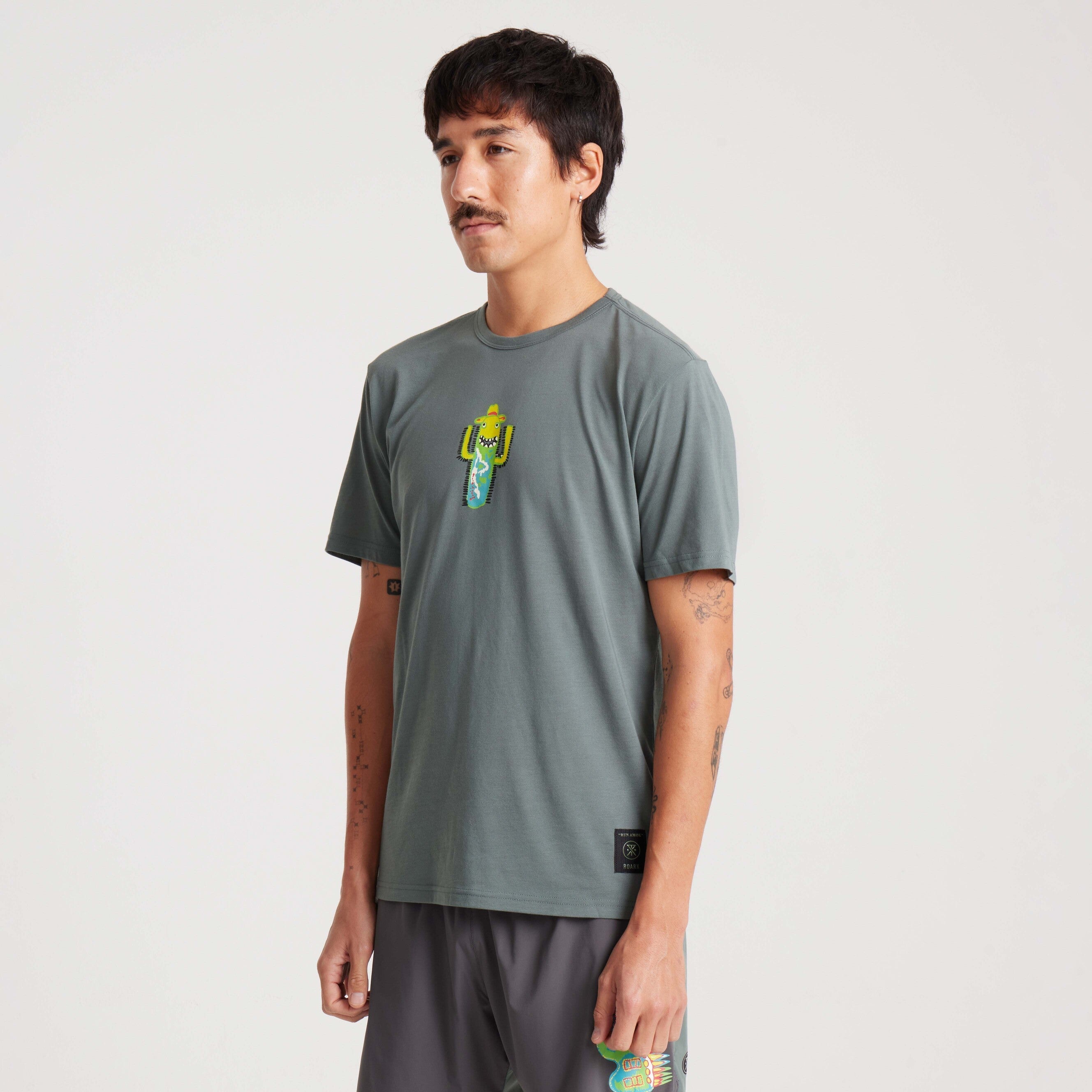 Side view of a green graphic tee with a unique cactus design, showcasing a clean silhouette and casual fit."