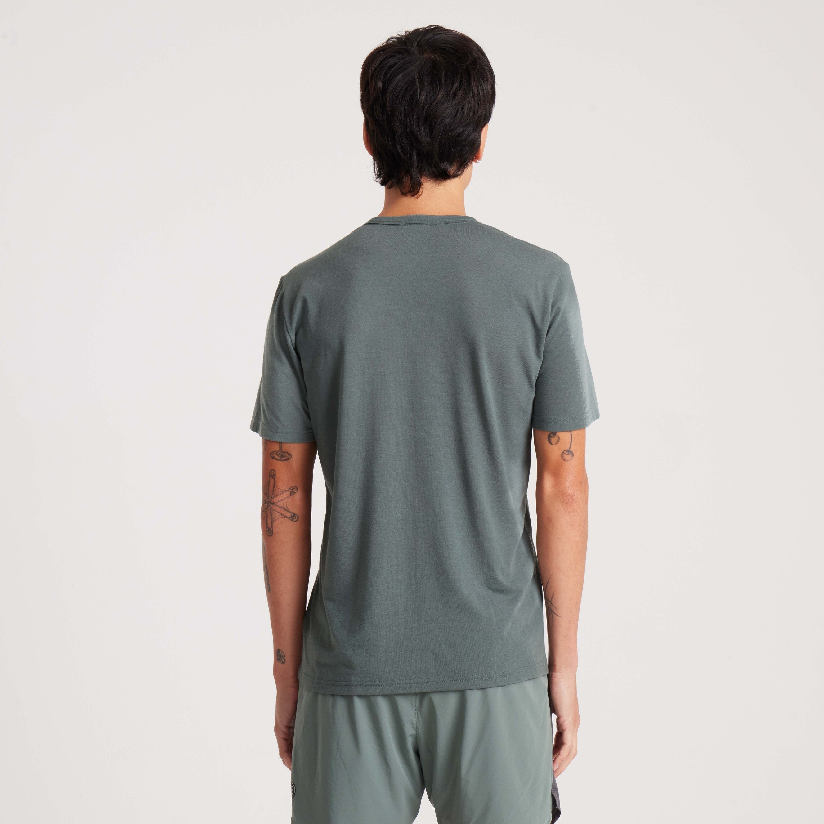 Back view of the green graphic tee with a comfortable fit, lightweight fabric, and versatile design.