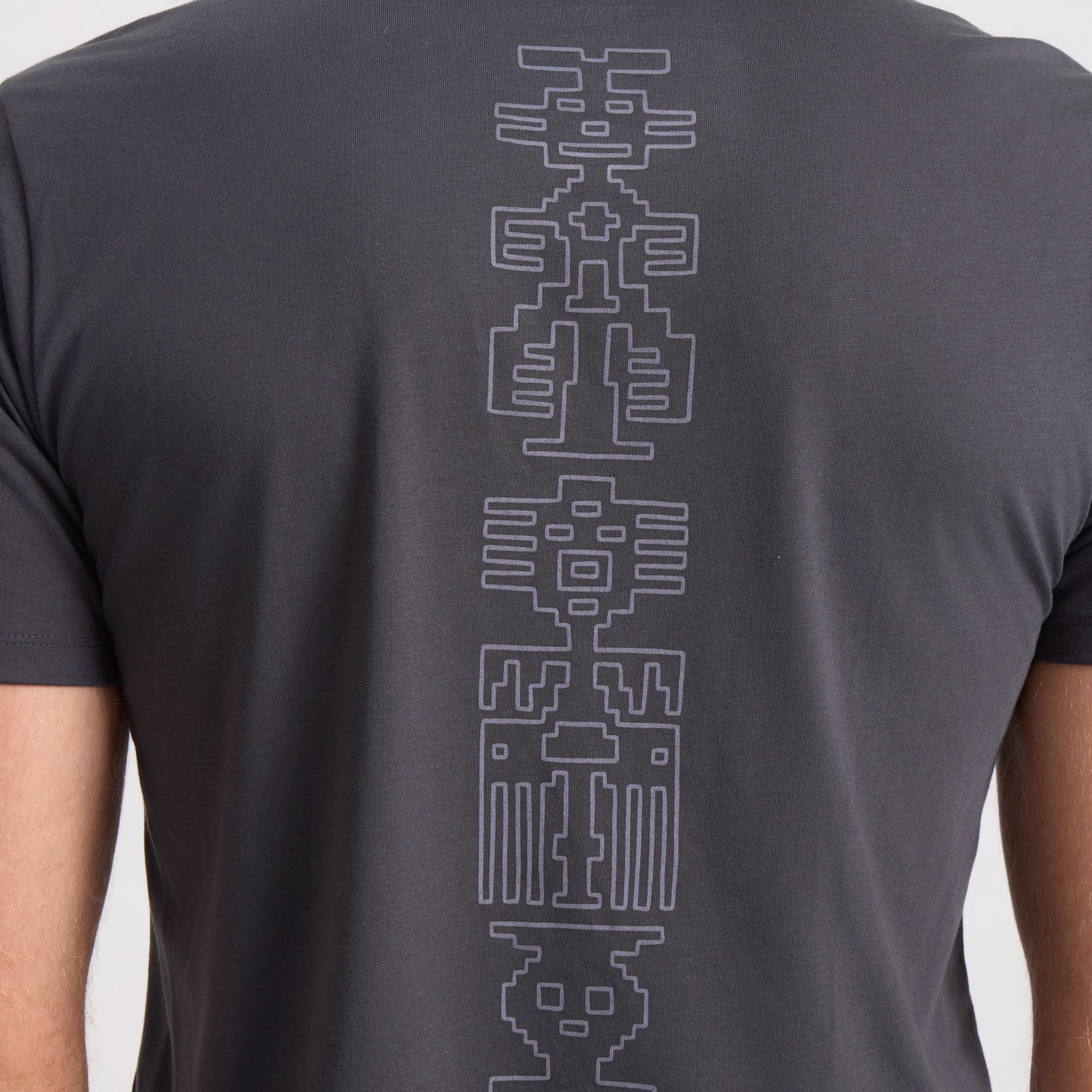 Close-up of a textured sleeve on a Roark active shirt designed for adventure and travel.