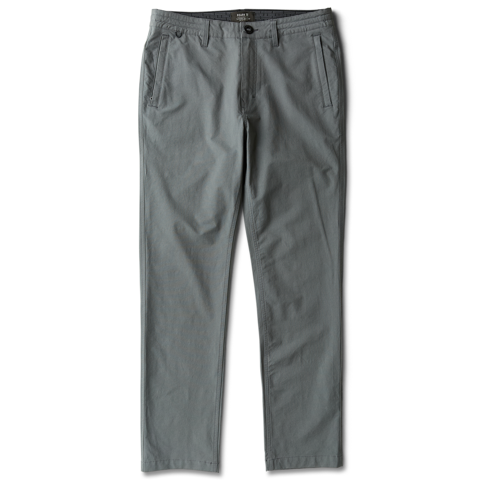 Roark adventurer exploring a scenic landscape, exemplifying the brand’s ethos of travel and outdoor exploration.