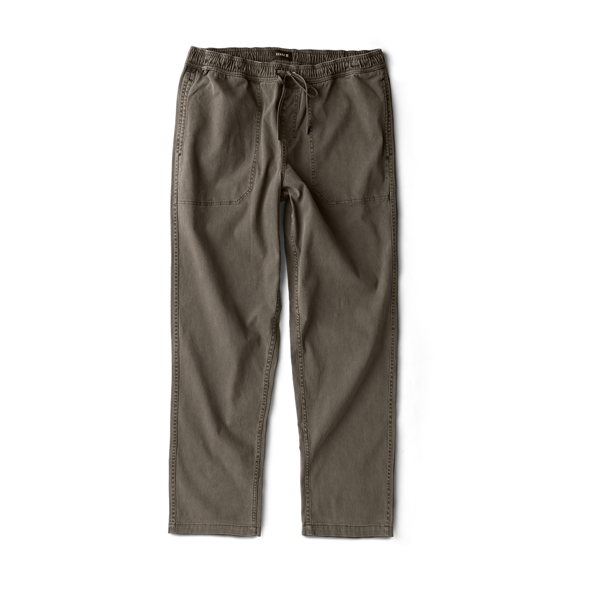 Close-up of a sophisticated pocket detail on a Roark adventure garment, ideal for secure storage during outdoor activities.