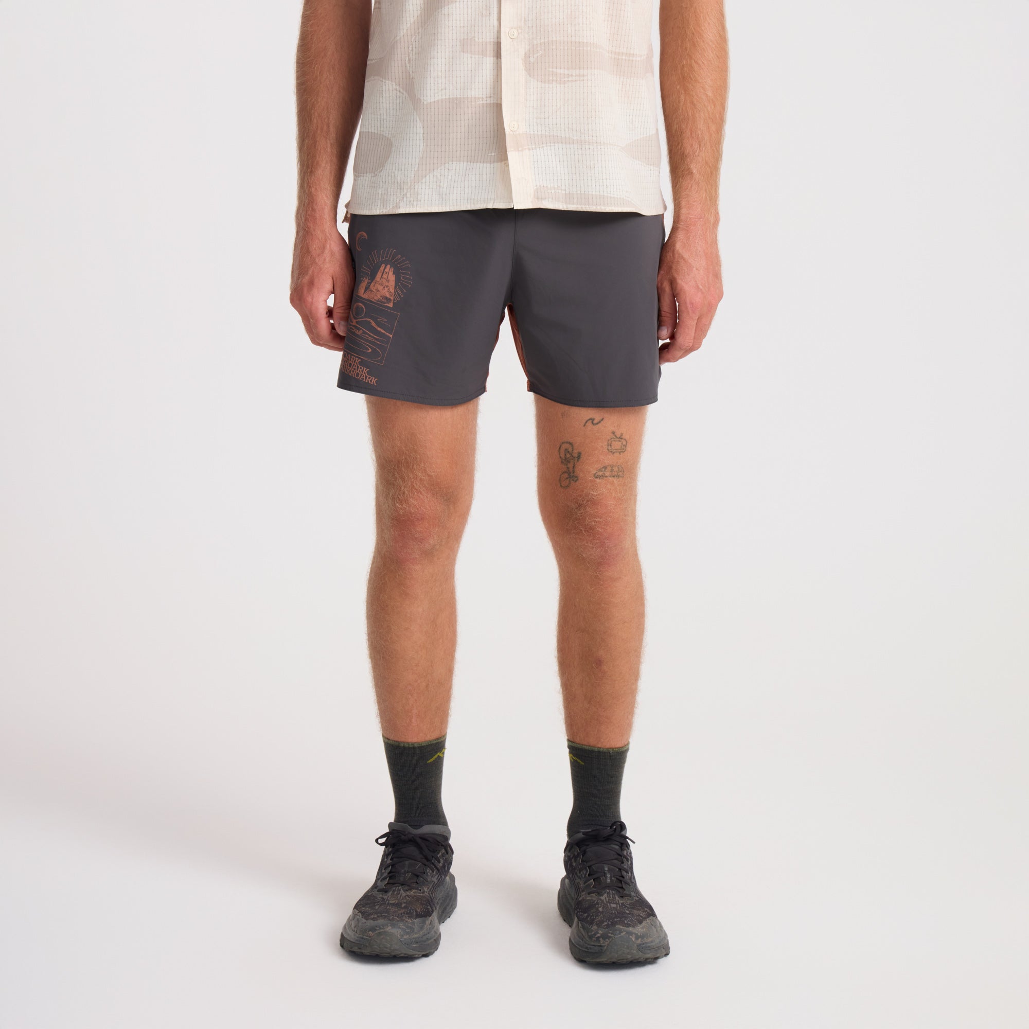 Variety of Roark men's shorts including active shorts, boardshorts, and Bermuda style, displayed on a model focusing on lower body and calf detail, perfect for adventure and travel.