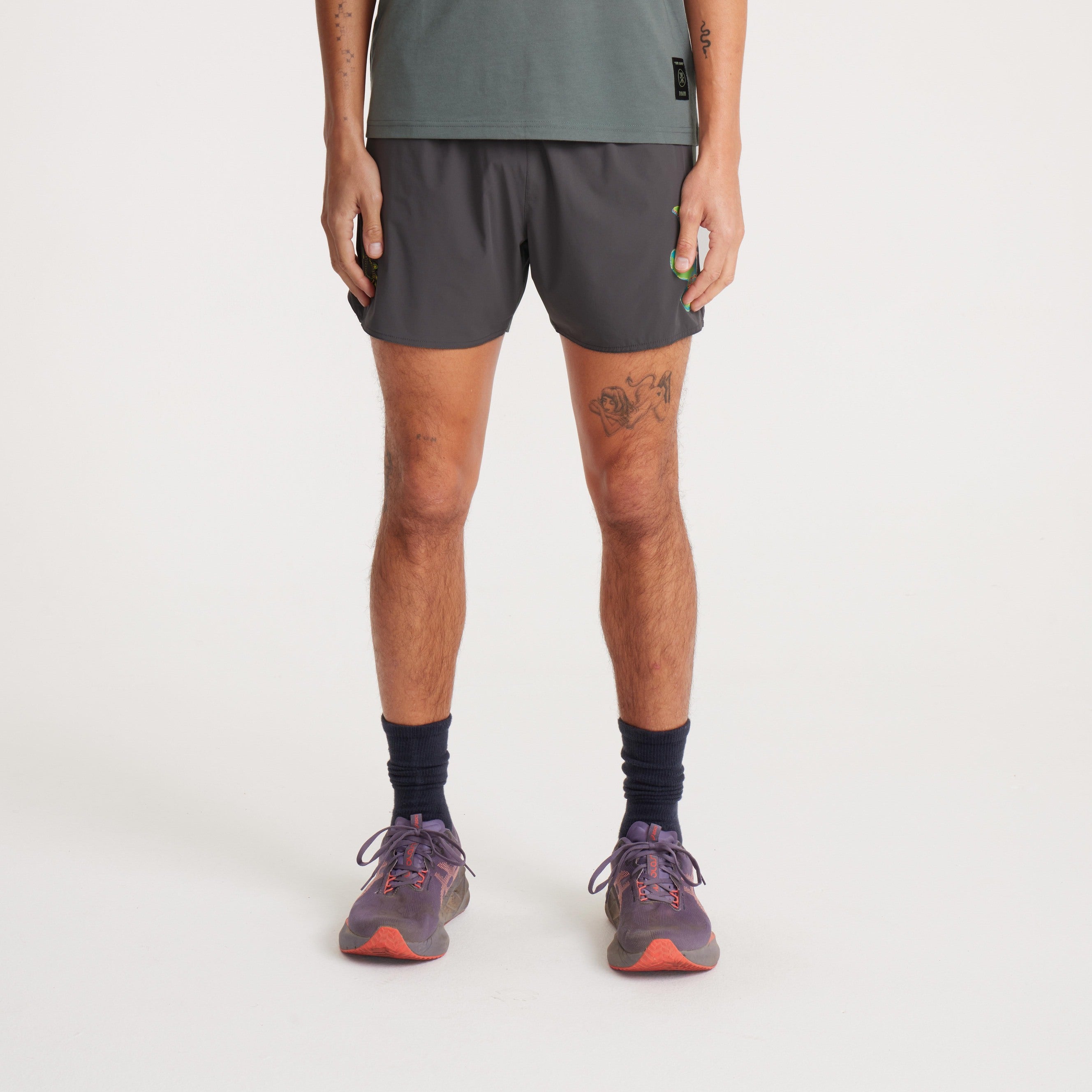 Discover versatile men's active shorts featuring a bold graphic design, perfect for workouts or casual wear.