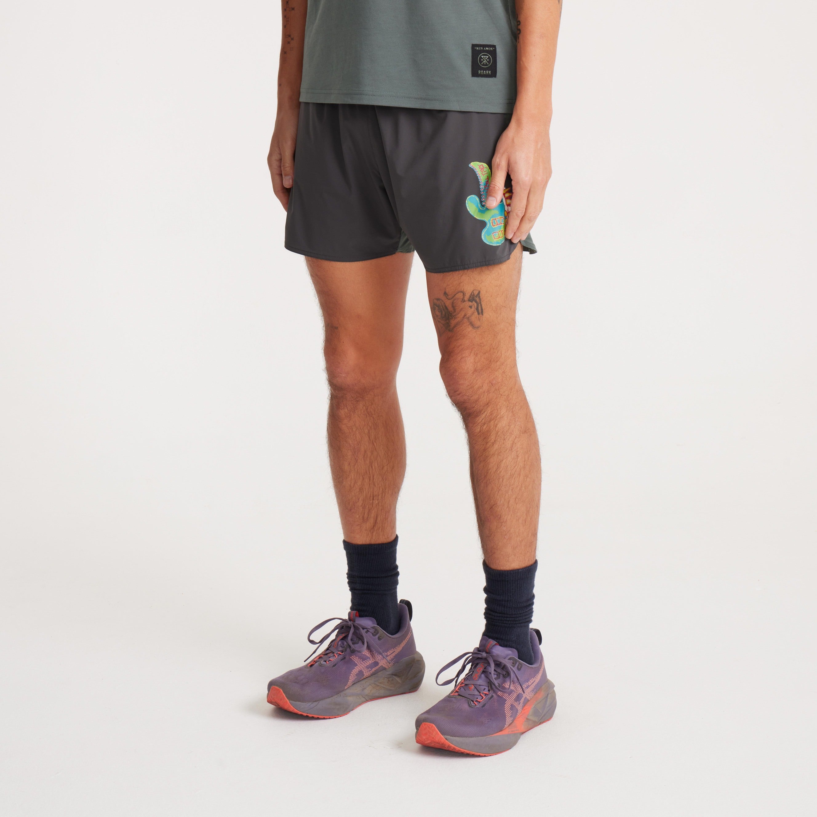 Stylish and functional men's active shorts with a vibrant printed graphic and a modern fit.