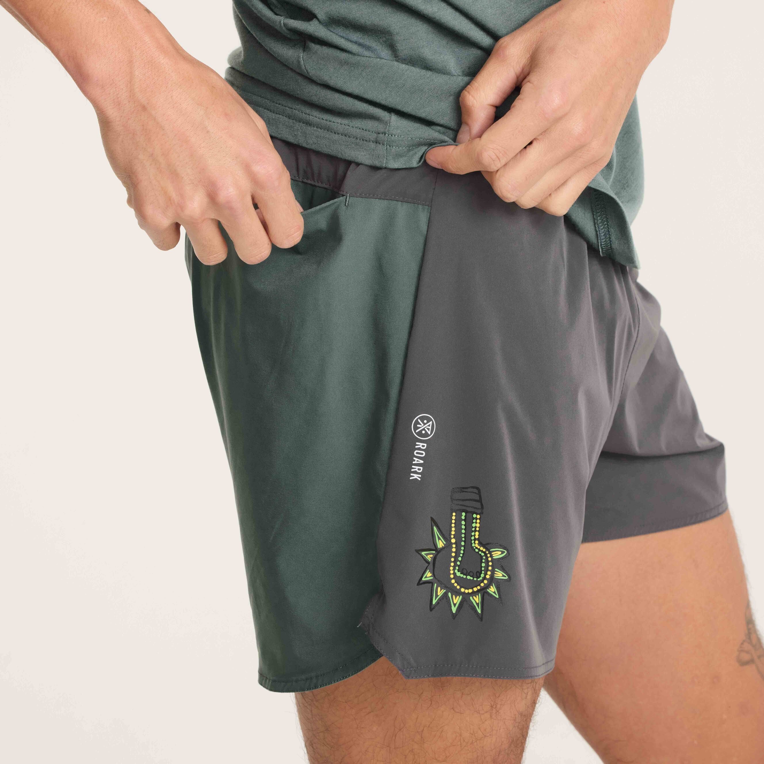 Bold and colorful graphic adds a unique touch to these men's active shorts, designed for optimal performance.