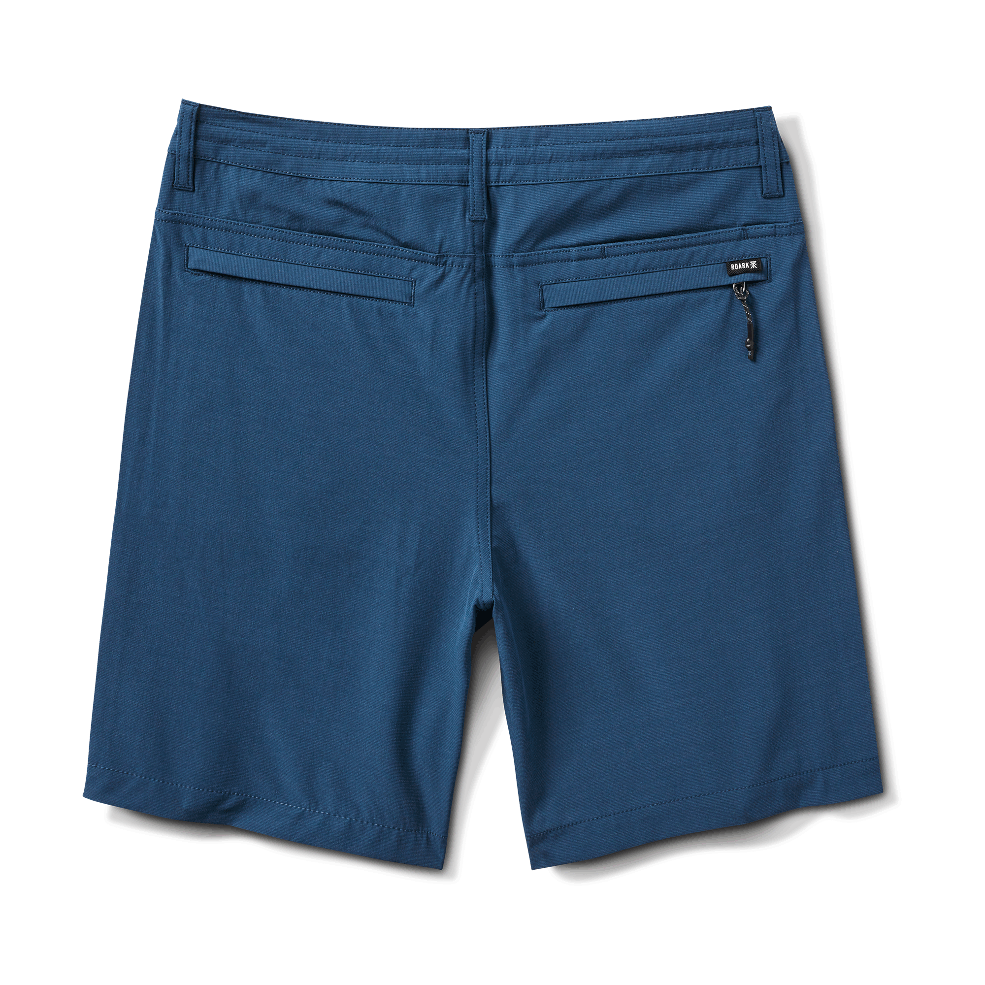 Back view of navy hybrid shorts with zippered back pockets for secure storage.