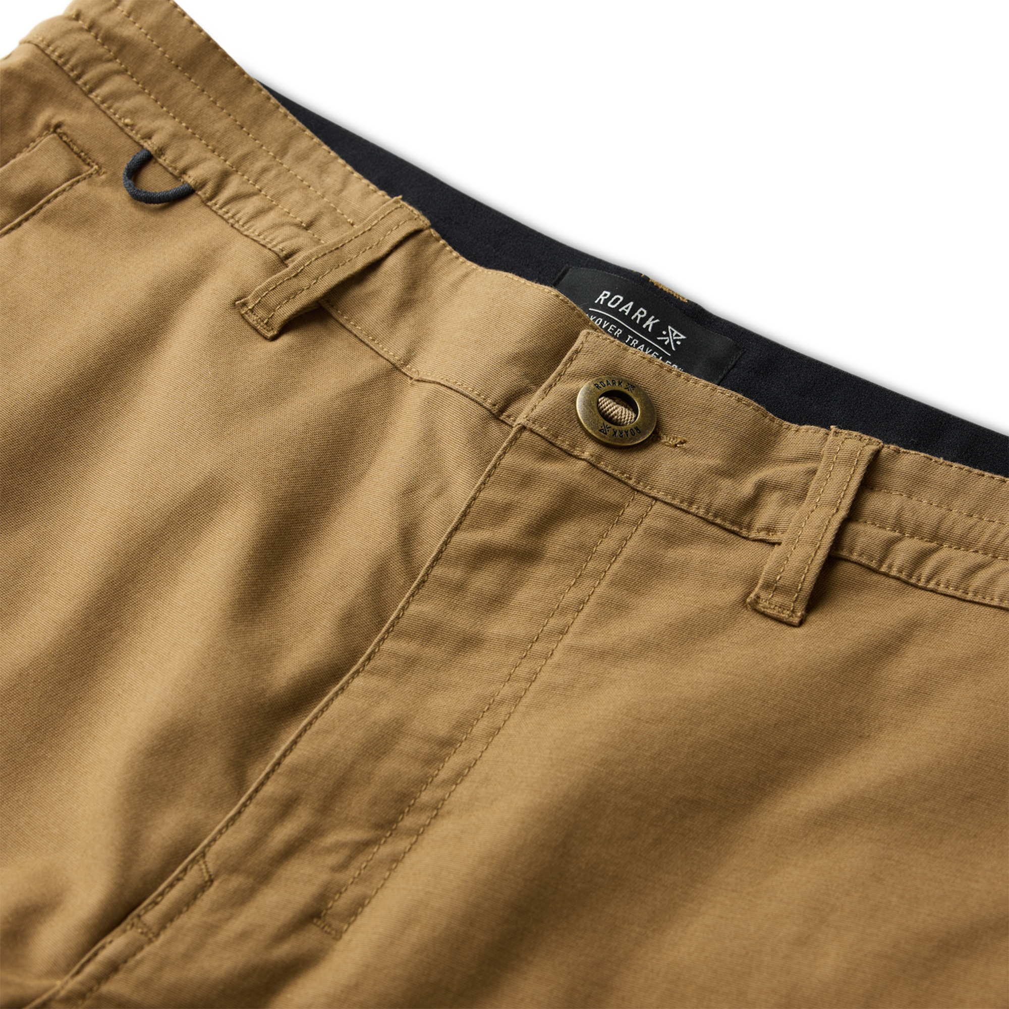 Adventure-ready backpack on rustic background, showcasing Roark's commitment to durability and style for travel and outdoor activities.