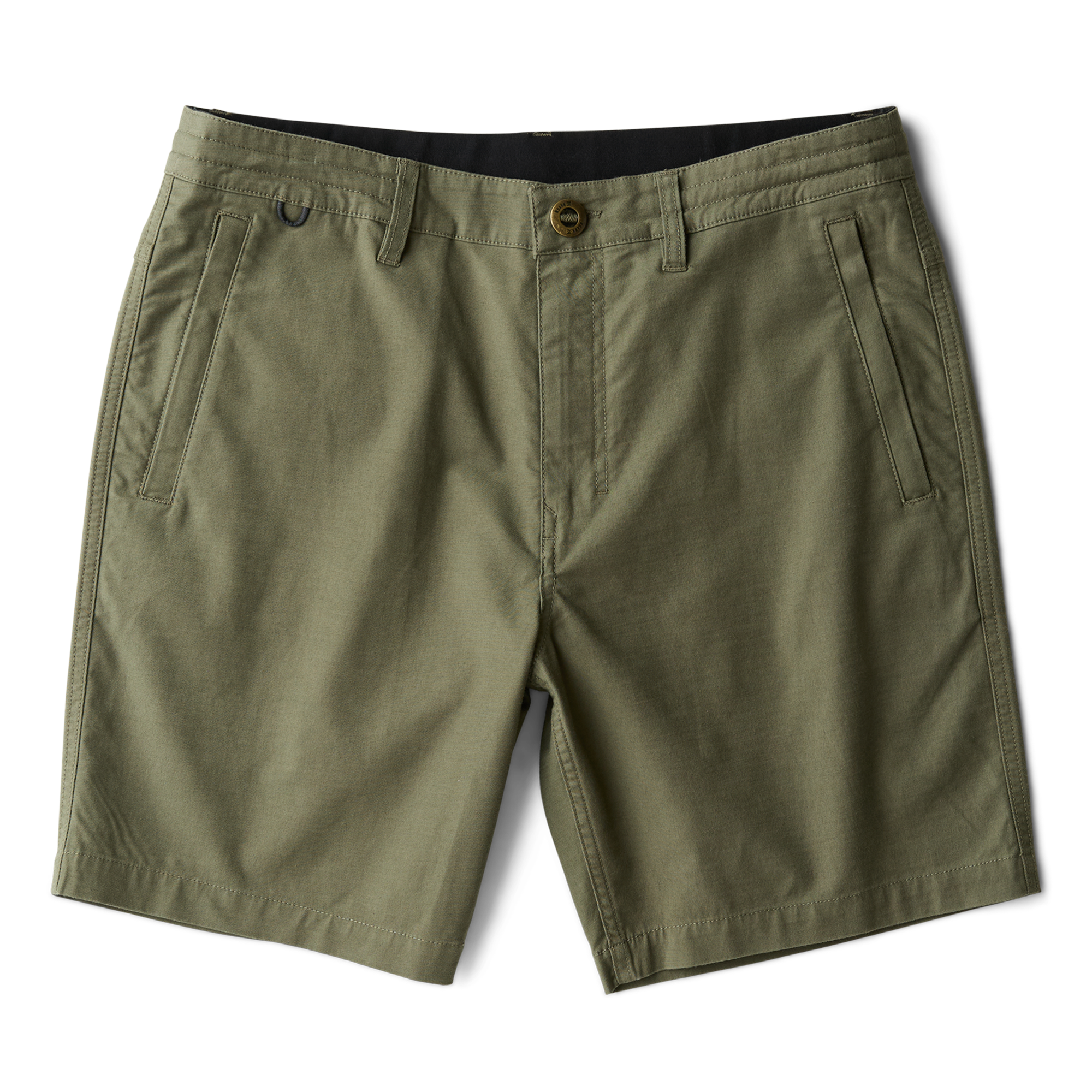 Adventurous traveler trekking through misty mountains with Roark gear.