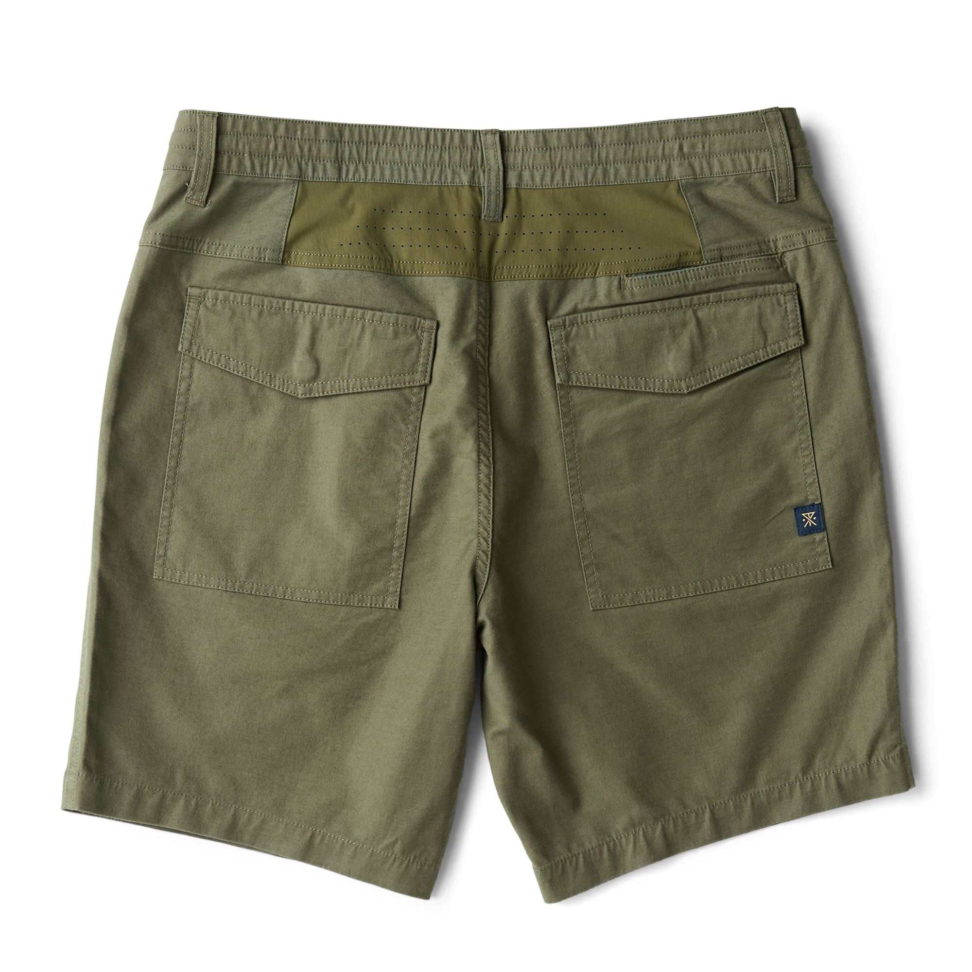 Roark adventure-inspired men's durable outdoor apparel in a natural setting, perfect for travel and exploration.