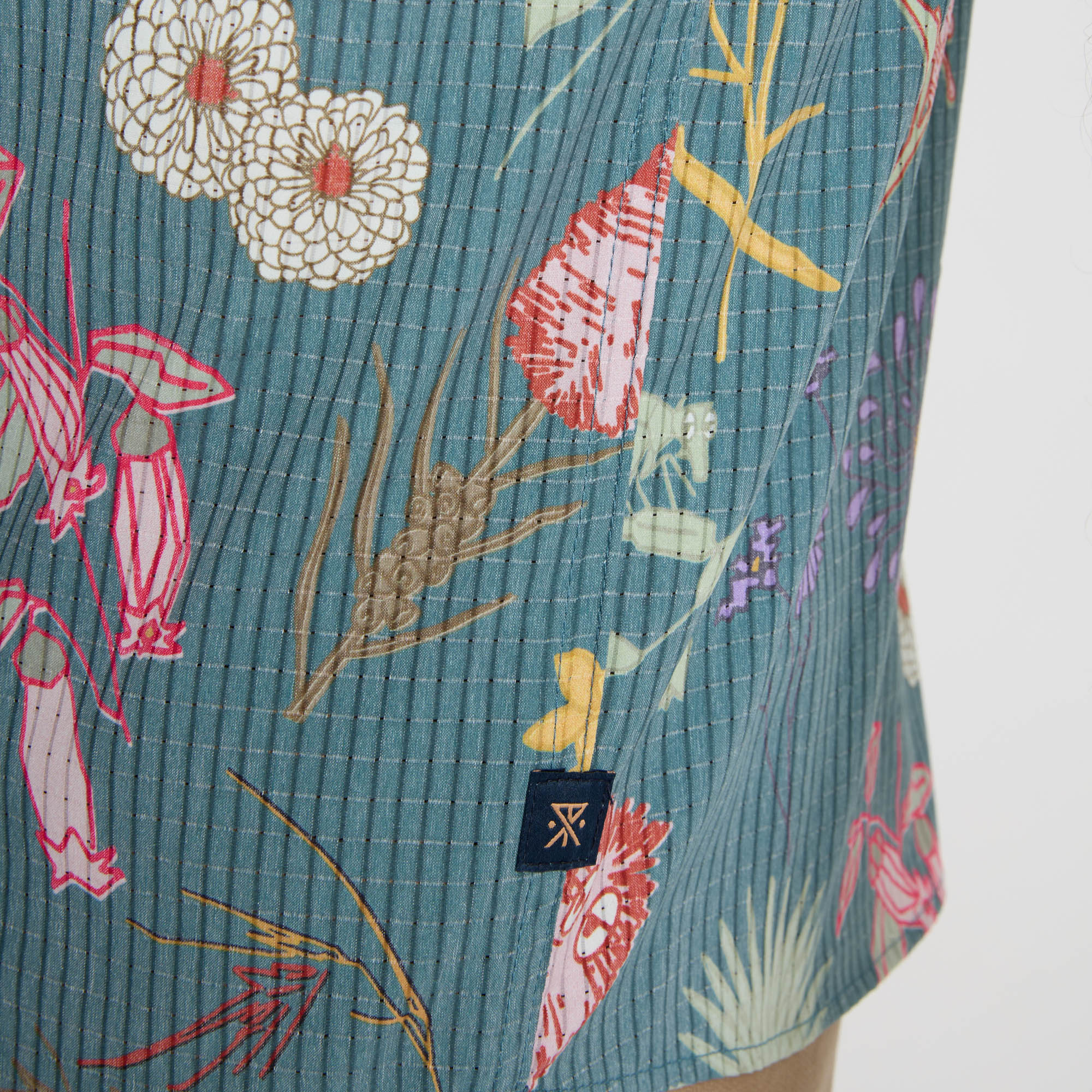 Vibrant pink day dress featuring a unique motif pattern, perfect for outdoor adventures or city exploration.