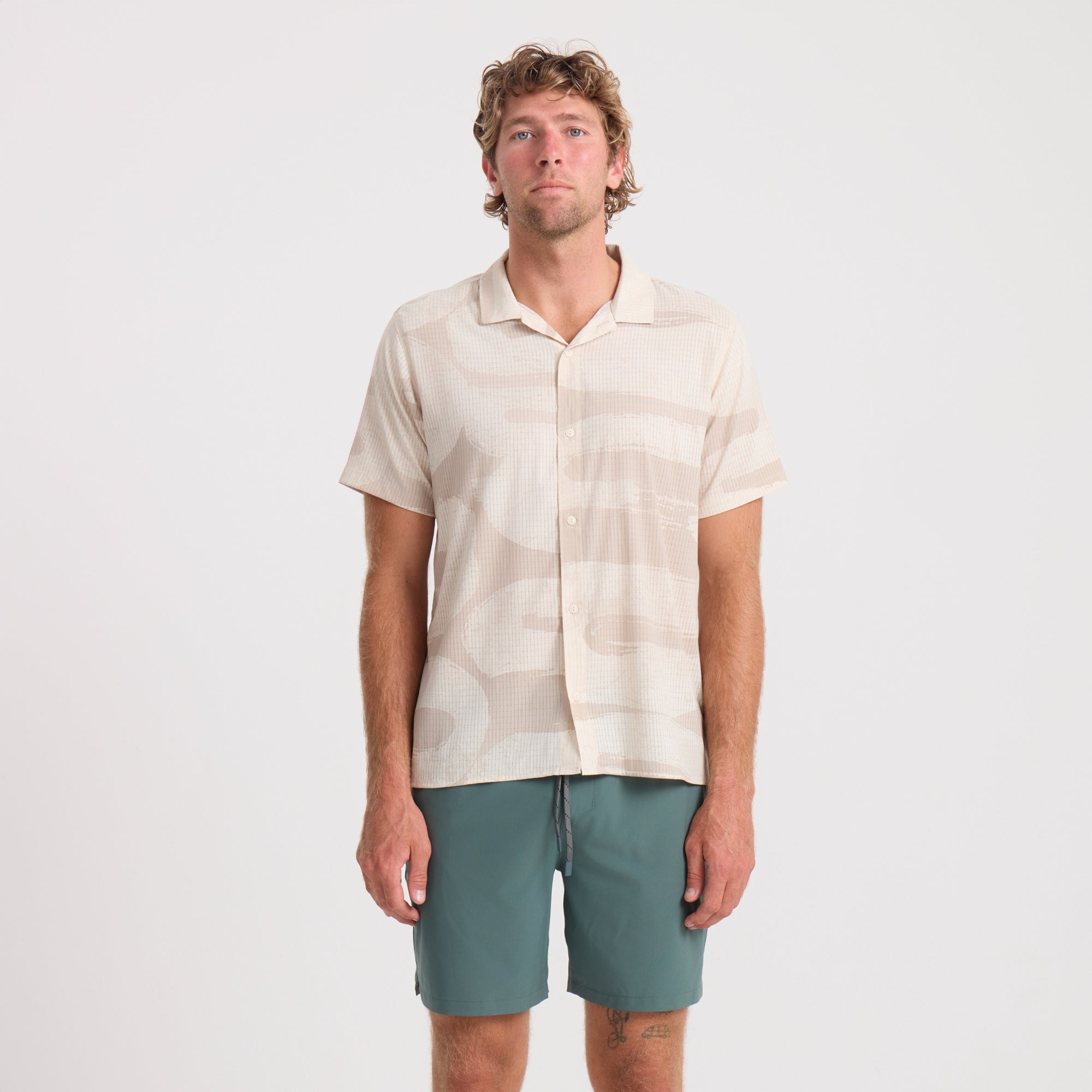 Variety of Roark men's adventure-ready shorts including active shorts, boardshorts, and Bermuda shorts displayed on a neutral background