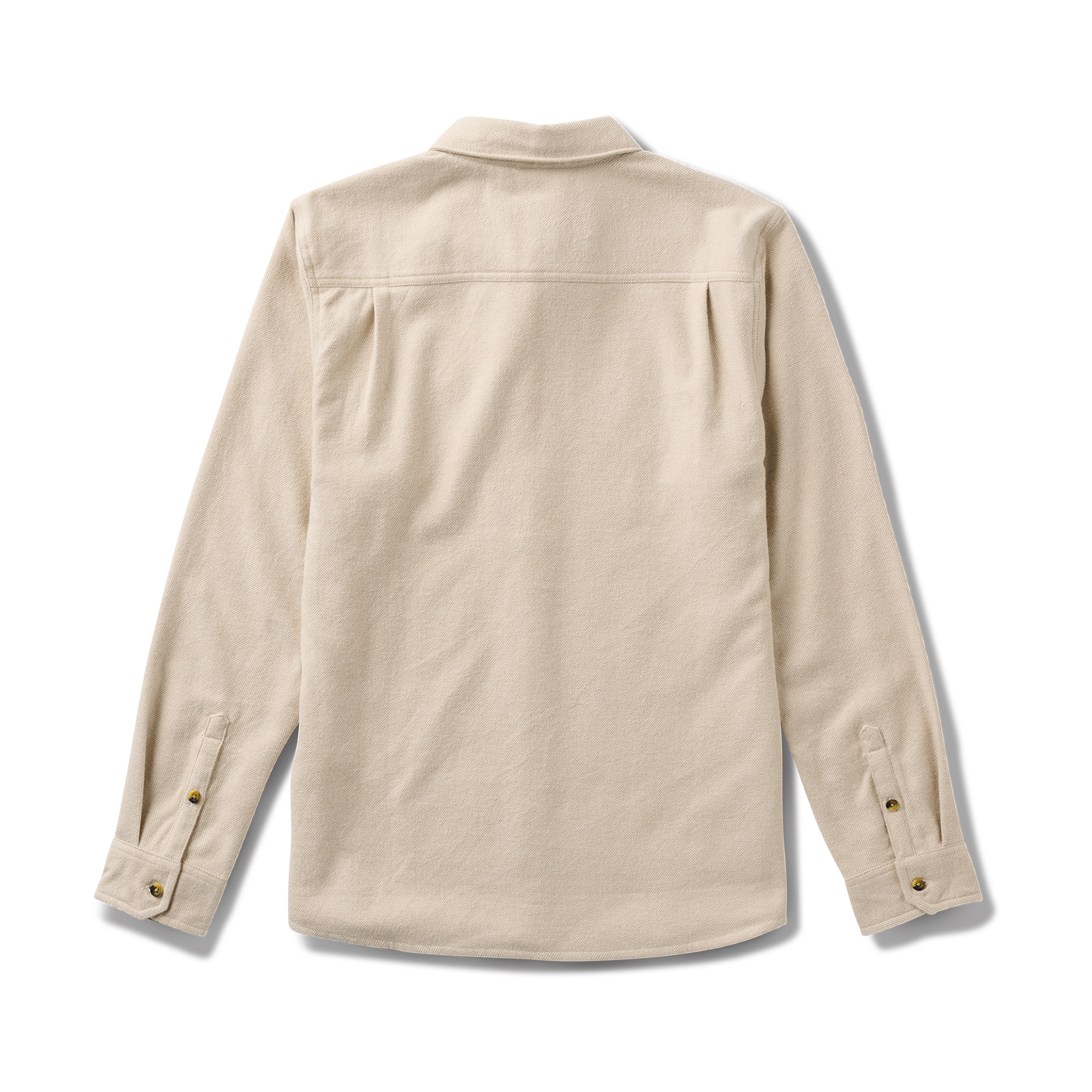 Close-up of a durable button on adventure apparel, emphasizing Roark's commitment to quality and durability in outdoor gear.