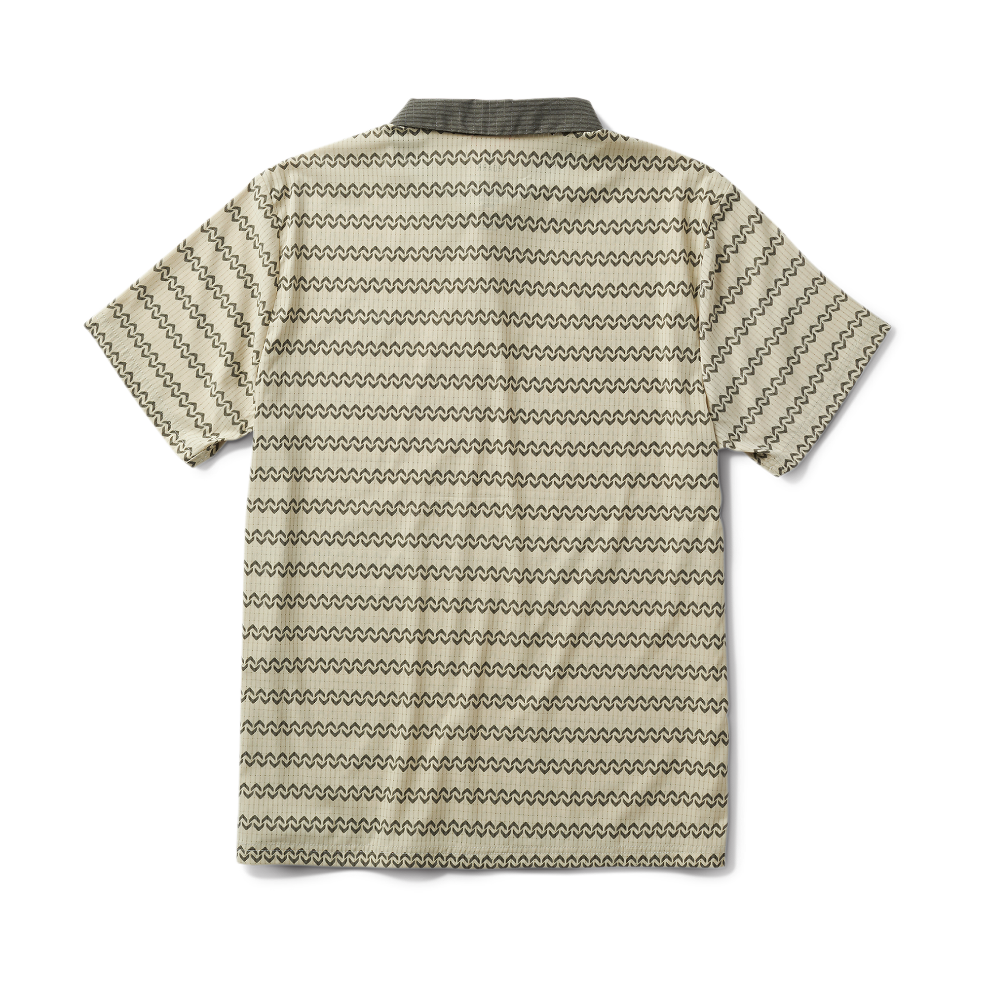 Detail of a Roark active polo shirt featuring unique design elements on the sleeve and collar, ideal for adventure and travel.