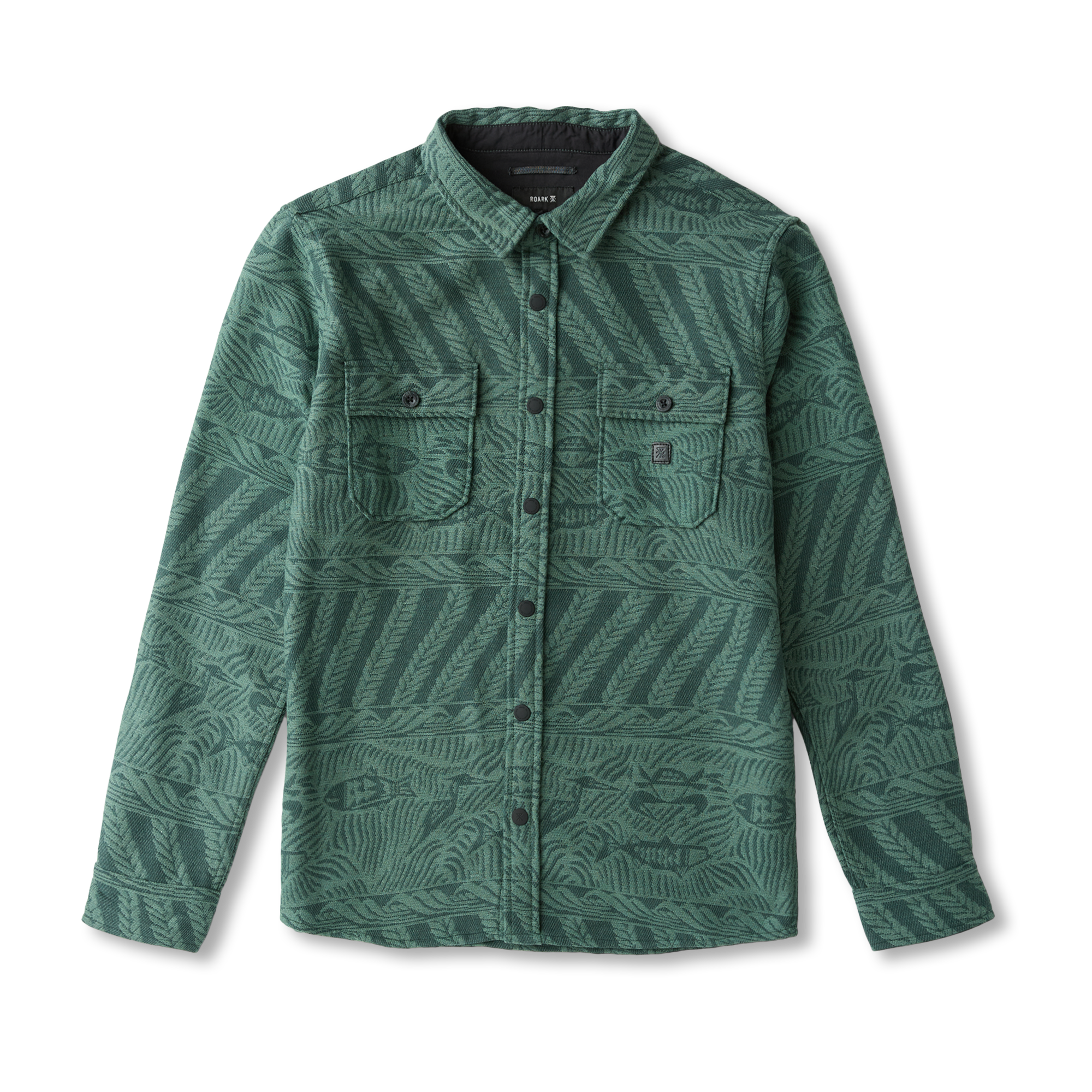 Close-up of a stylish button and pocket detail showcasing unique pattern, emphasizing Roark's commitment to adventure-ready apparel.