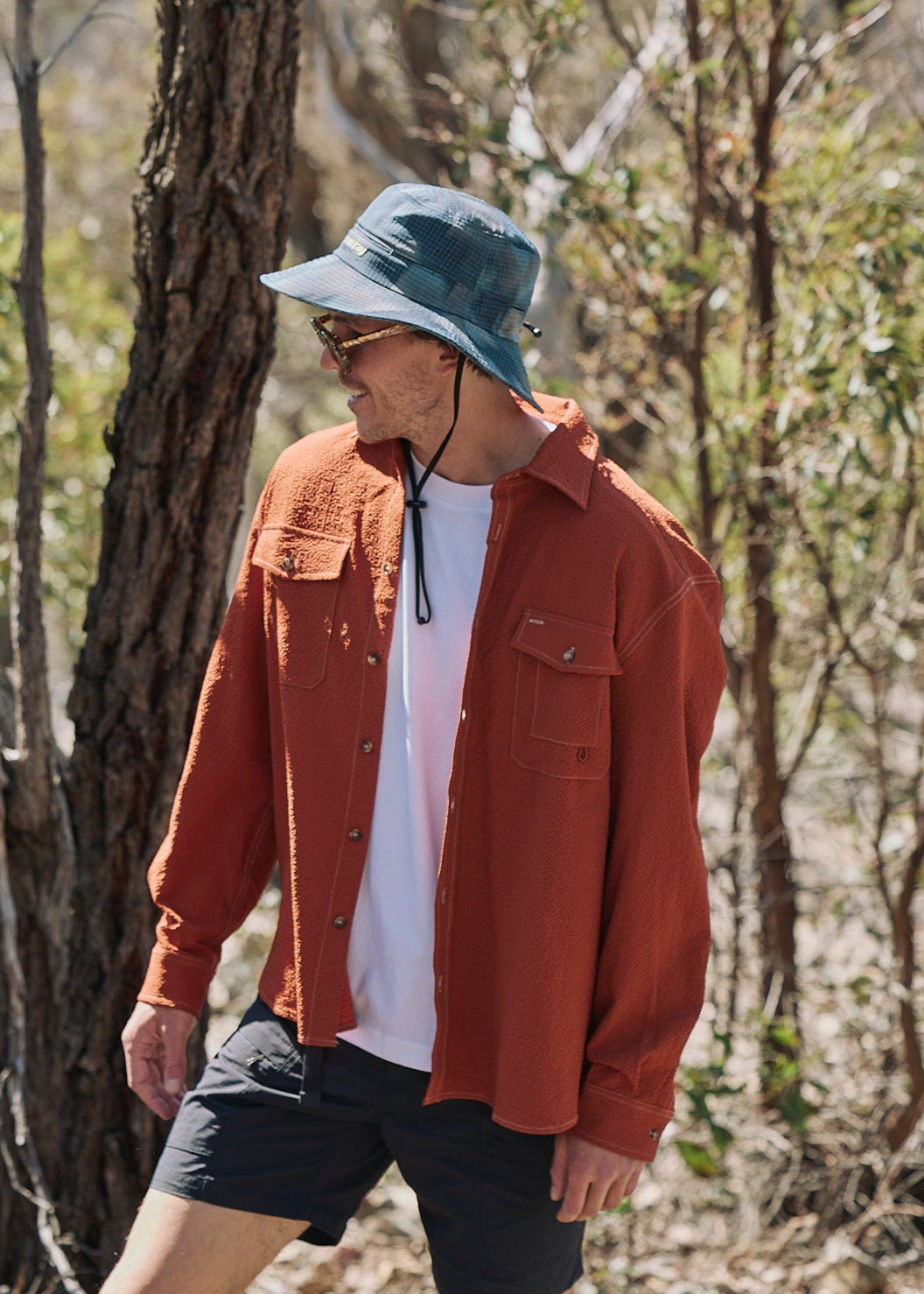 Person wearing Sun Ray UPF50+ sun protection seersucker overshirt sun shirt