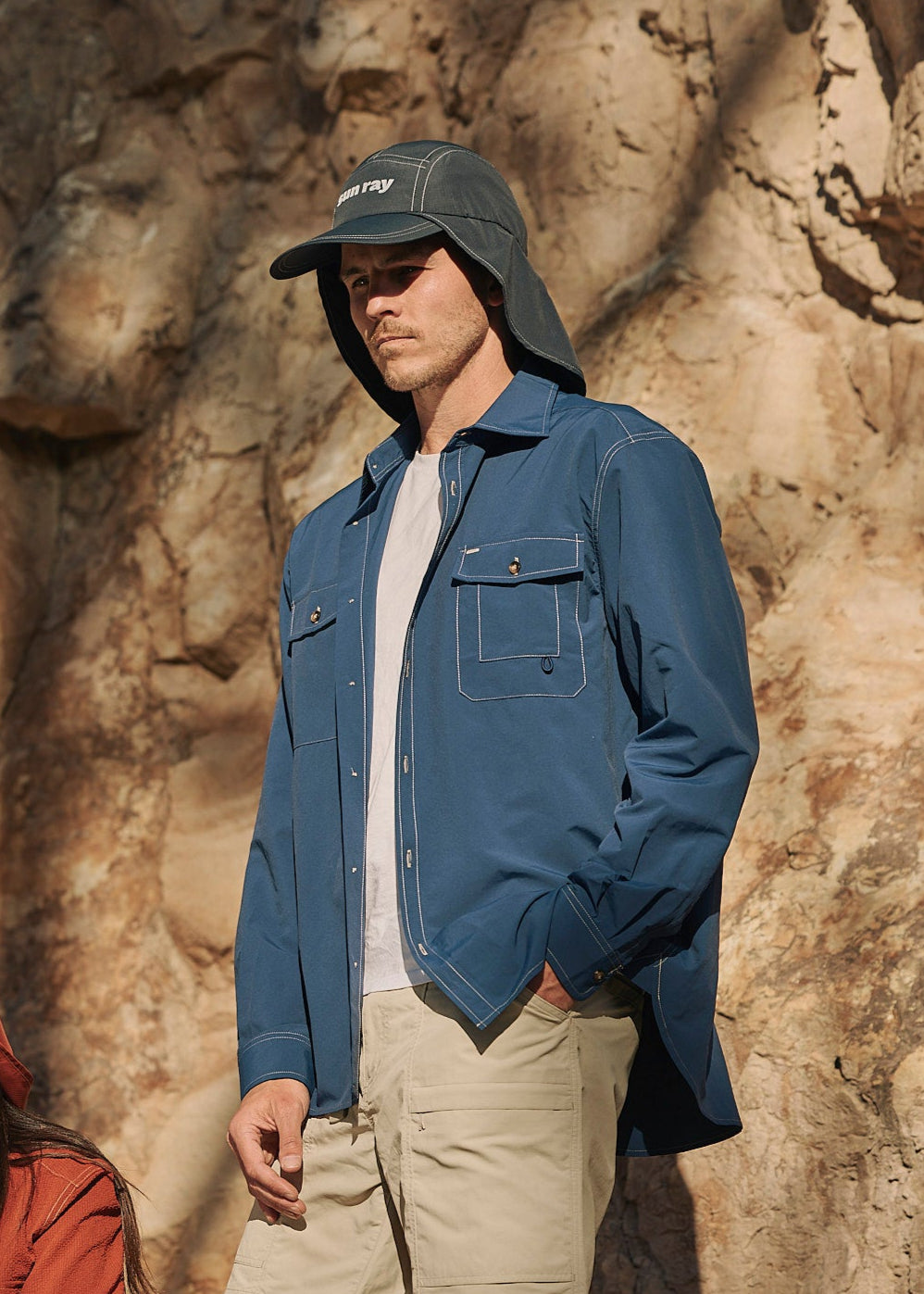 Person wearing a blue Sun Ray UPF50+ sun protection overshirt sun shirt