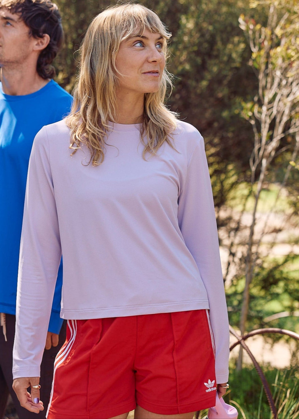 A sun smart woman wears the Sun Ray UPF50+ Sun Protection Clothing All G Long Sleeve Tee lilac boxy fit