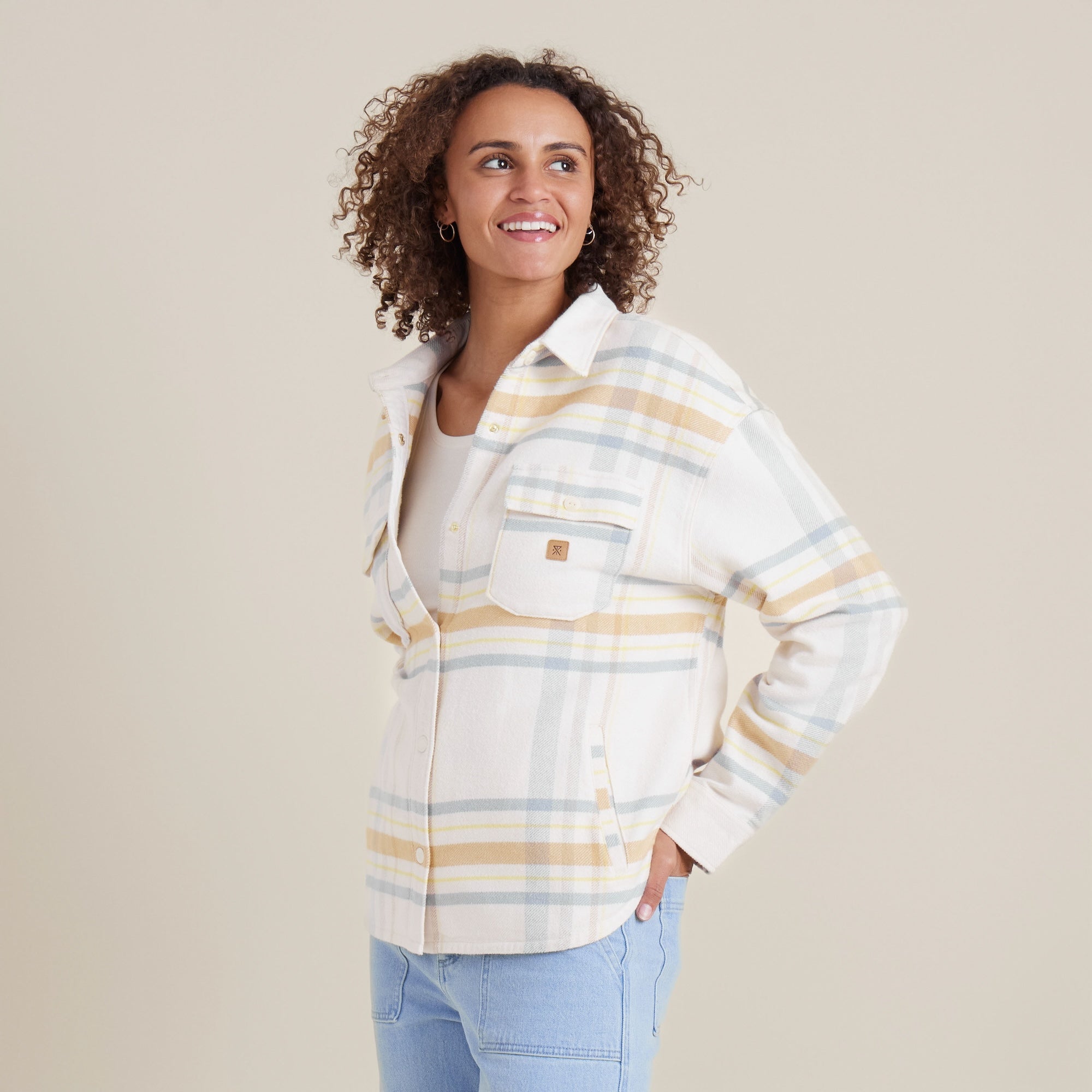 Side view of the Amberley Dusk plaid shirt by Roark, showcasing its soft fabric and relaxed silhouette for all-day comfort.