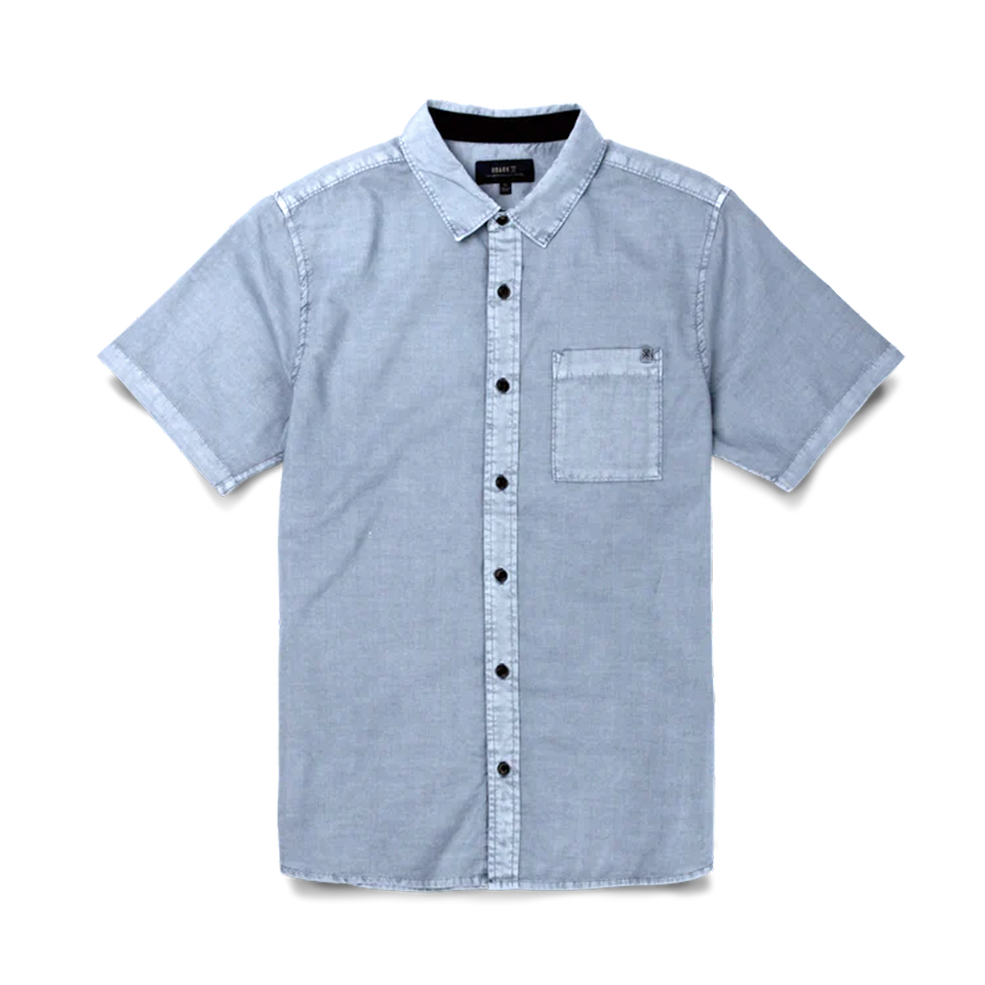 Close-up of a rugged denim dress shirt featuring durable buttons and a crisp collar, ideal for adventure and travel.